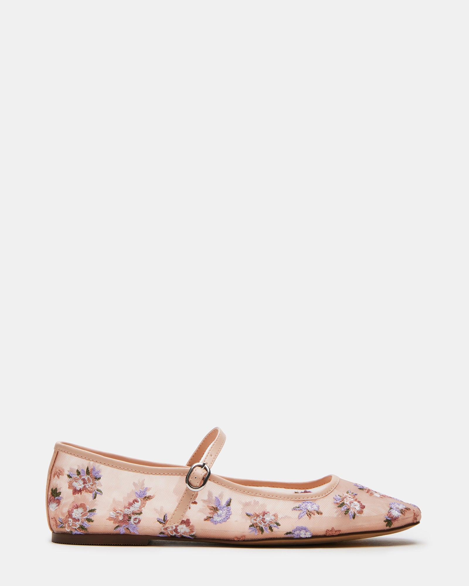 Maple Floral Mary Jane flats styled with jeans for a casual look.