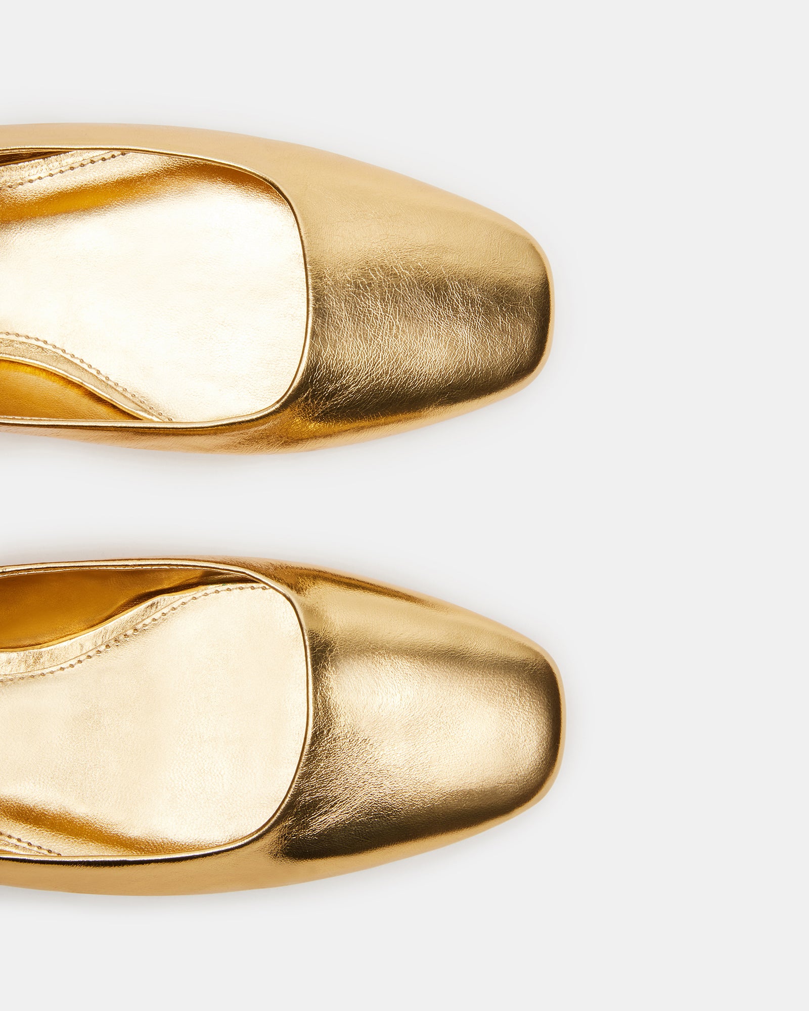 Side view of black ballet flats with square toe and Mary Jane strap