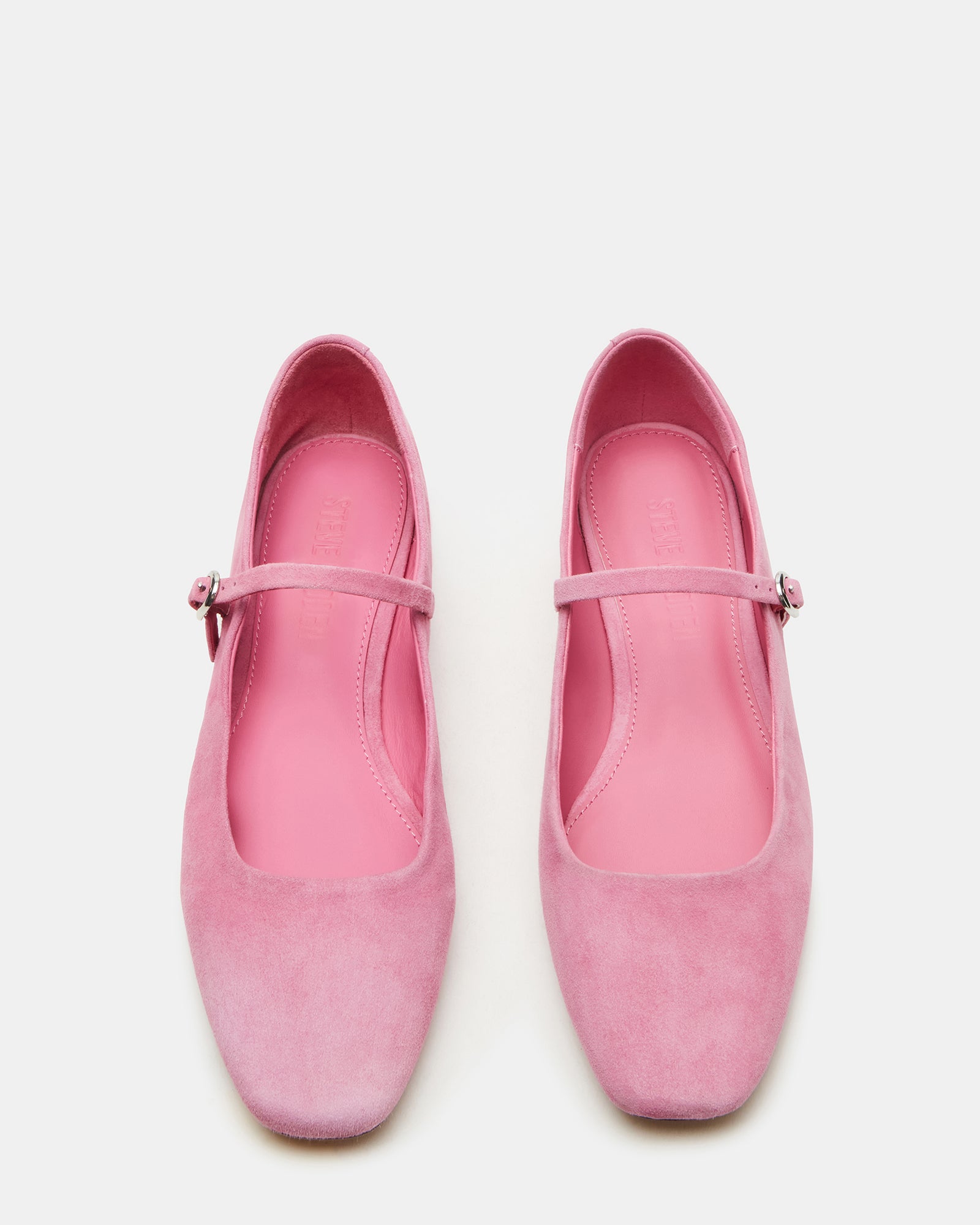 Side profile of the red suede ballet flats showing square toe design.