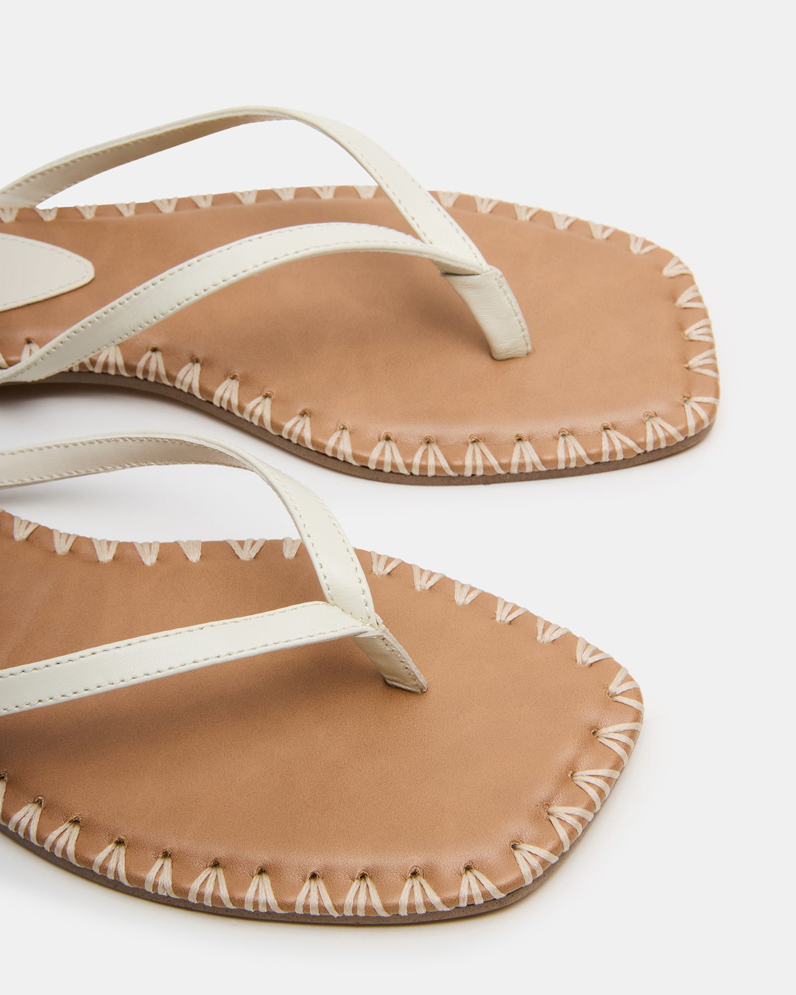 Side view of Marella bone leather sandals showing ankle strap detail