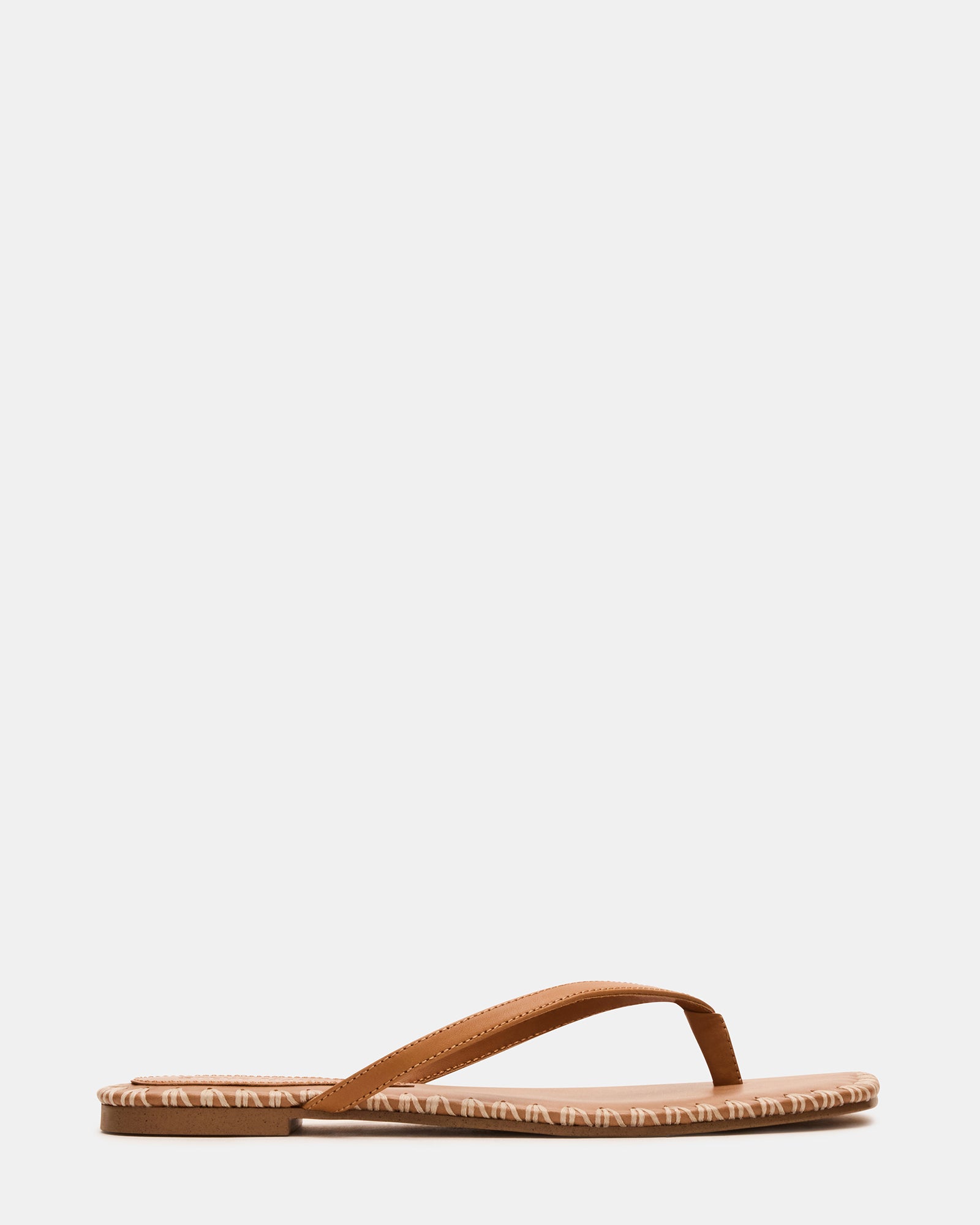 Side view of MARELLA cognac leather sandals on a wooden surface.