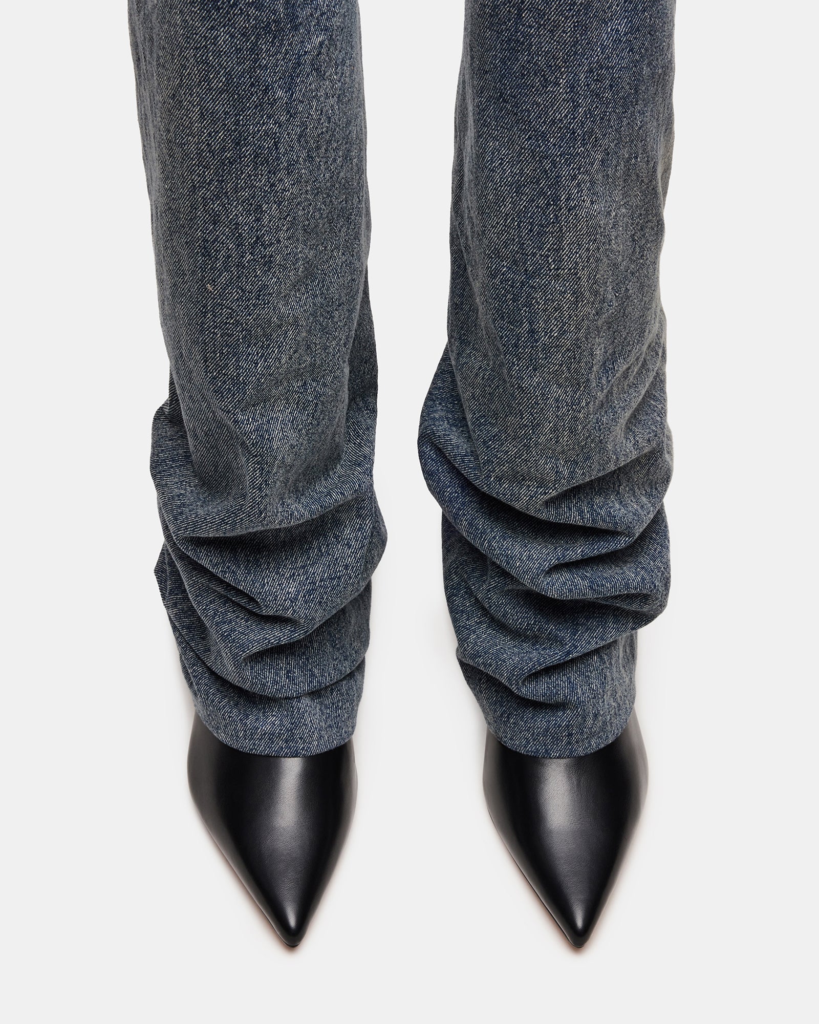 Side view of Chic Marengo Denim Pointed Toe Boots showcasing the sleek stiletto heels.
