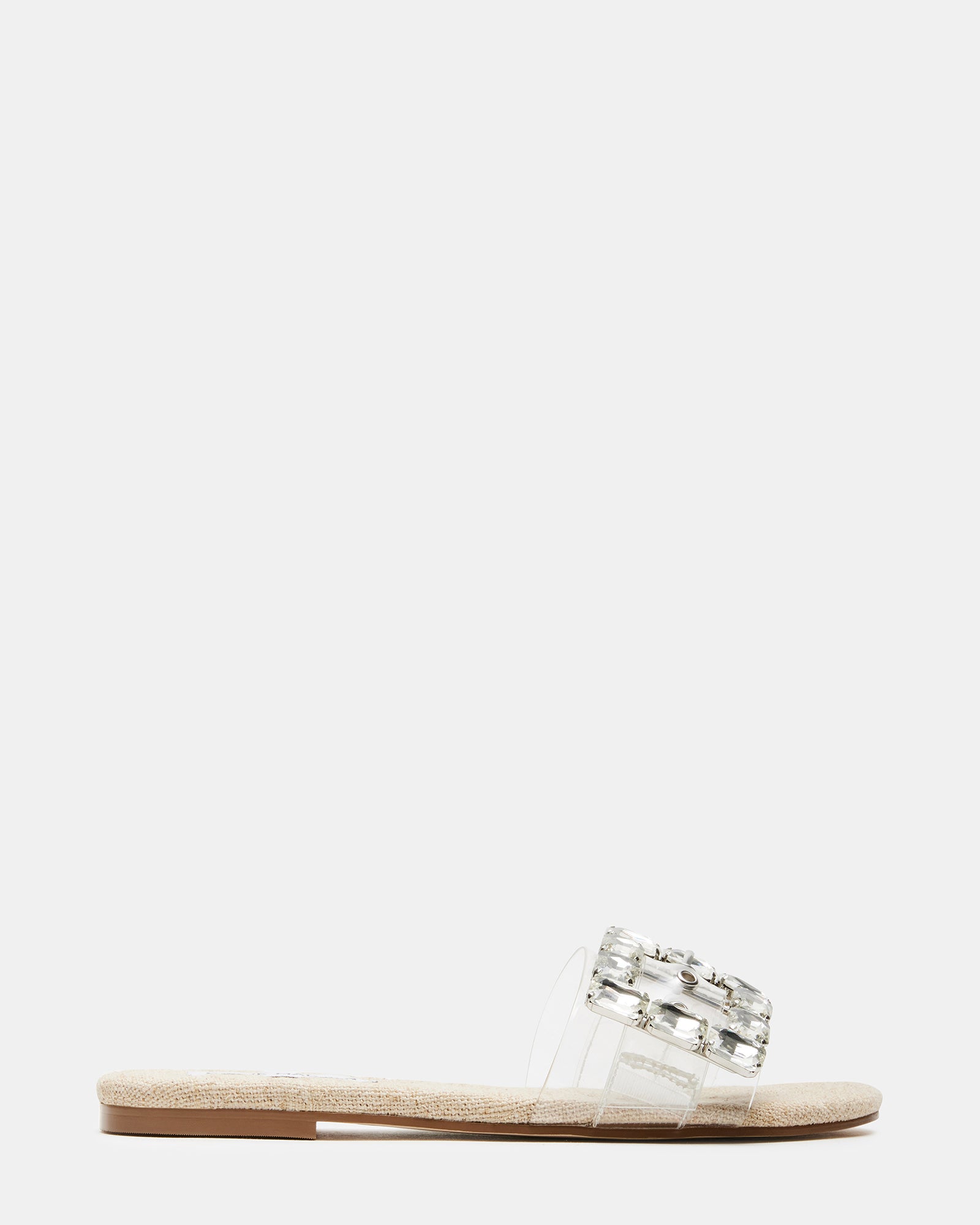 Side view of MARIKA clear rhinestone slide sandals showing the chunky buckle
