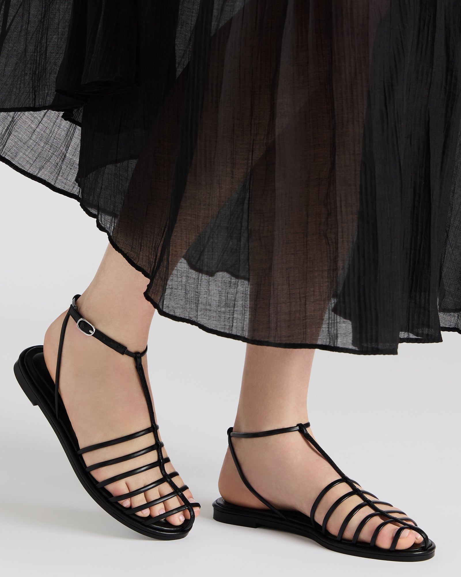 Stylish shot of Marin Breeze fisherman sandals paired with summer attire.