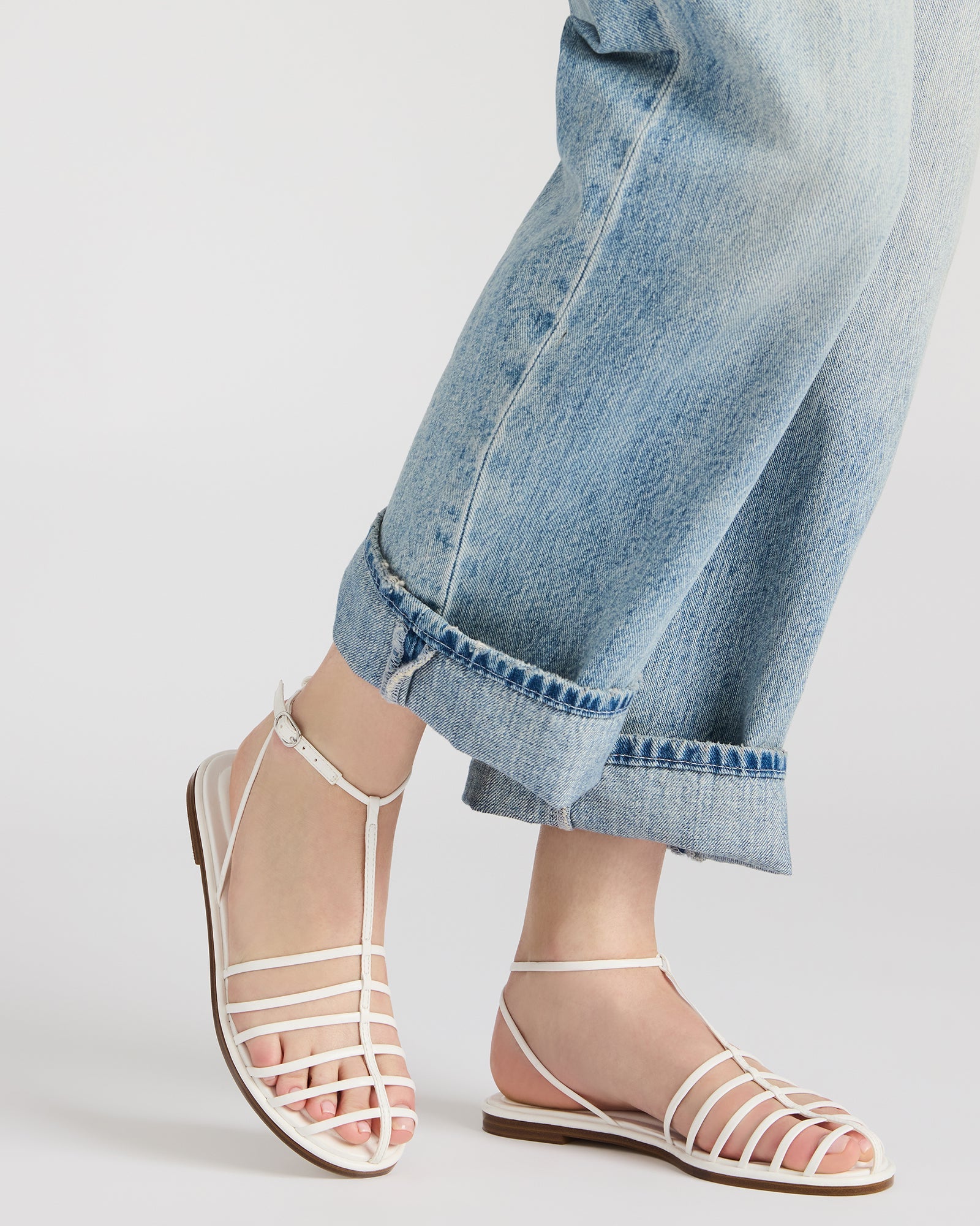Top-down image highlighting fisherman-style cage detailing and vegan leather texture