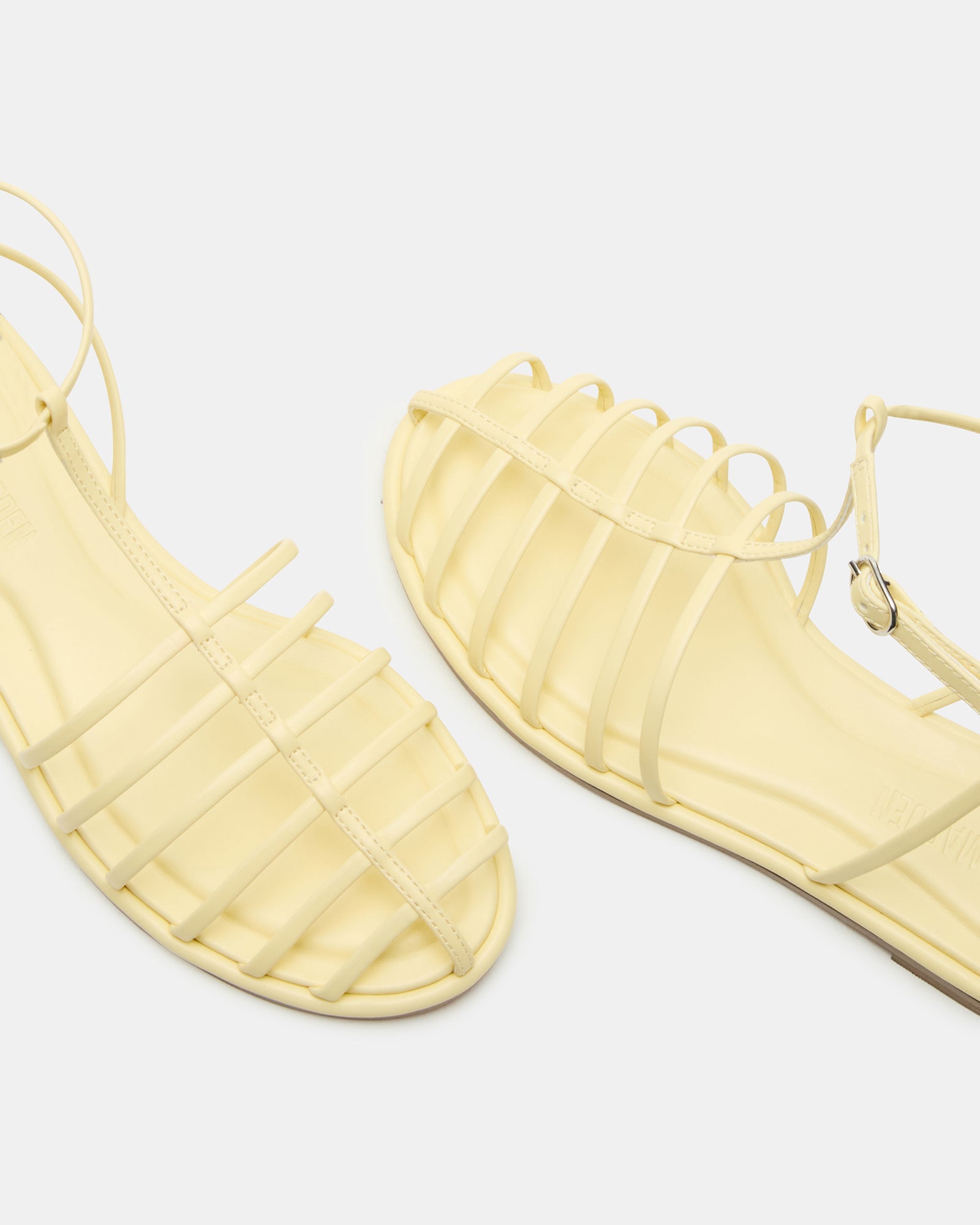 Stylish shot of Marin Breeze fisherman sandals paired with summer attire.