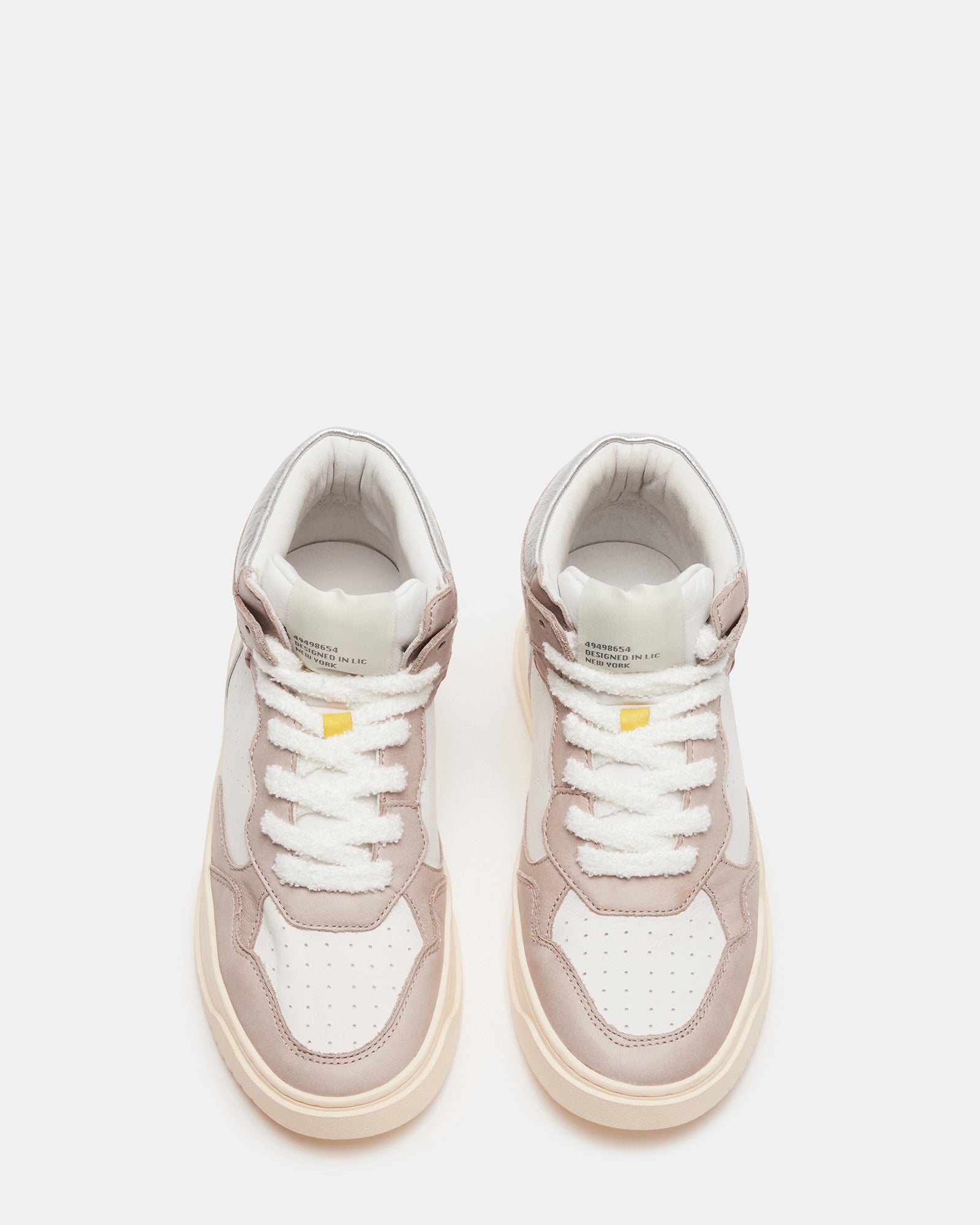 Side view of MARKED high top sneakers showcasing taupe leather and metallic panels.