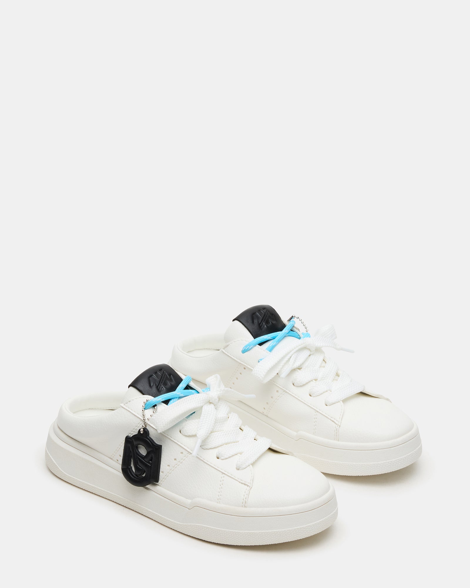 Side profile of Marney sneakers highlighting the low-top silhouette and synthetic sole