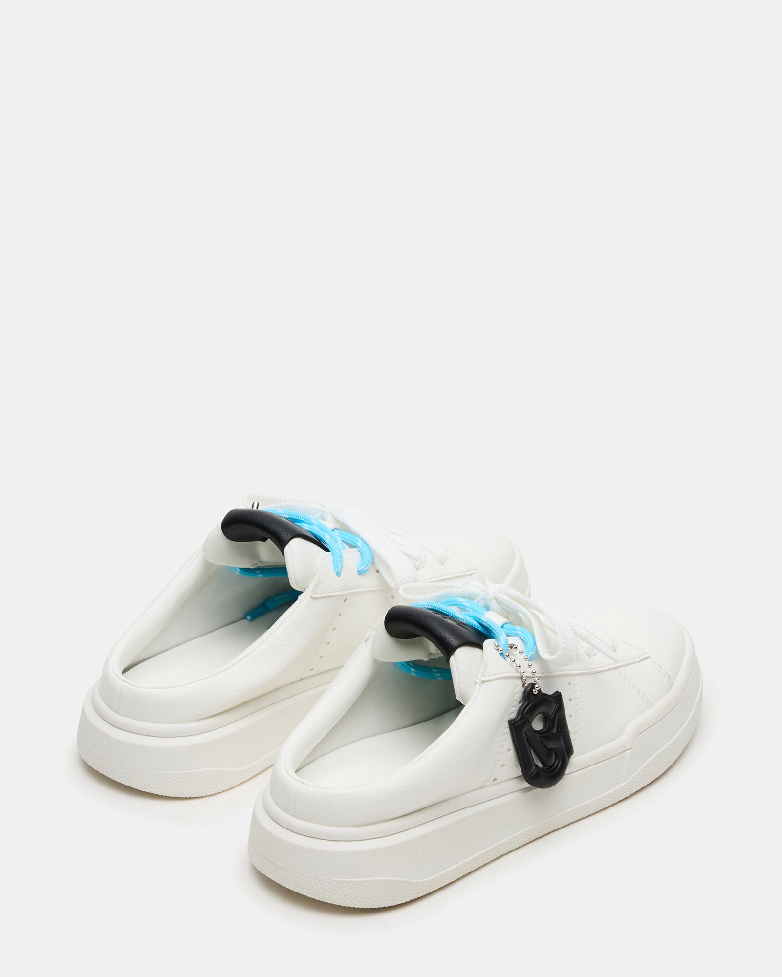 Side profile of Marney sneakers highlighting the low-top silhouette and synthetic sole