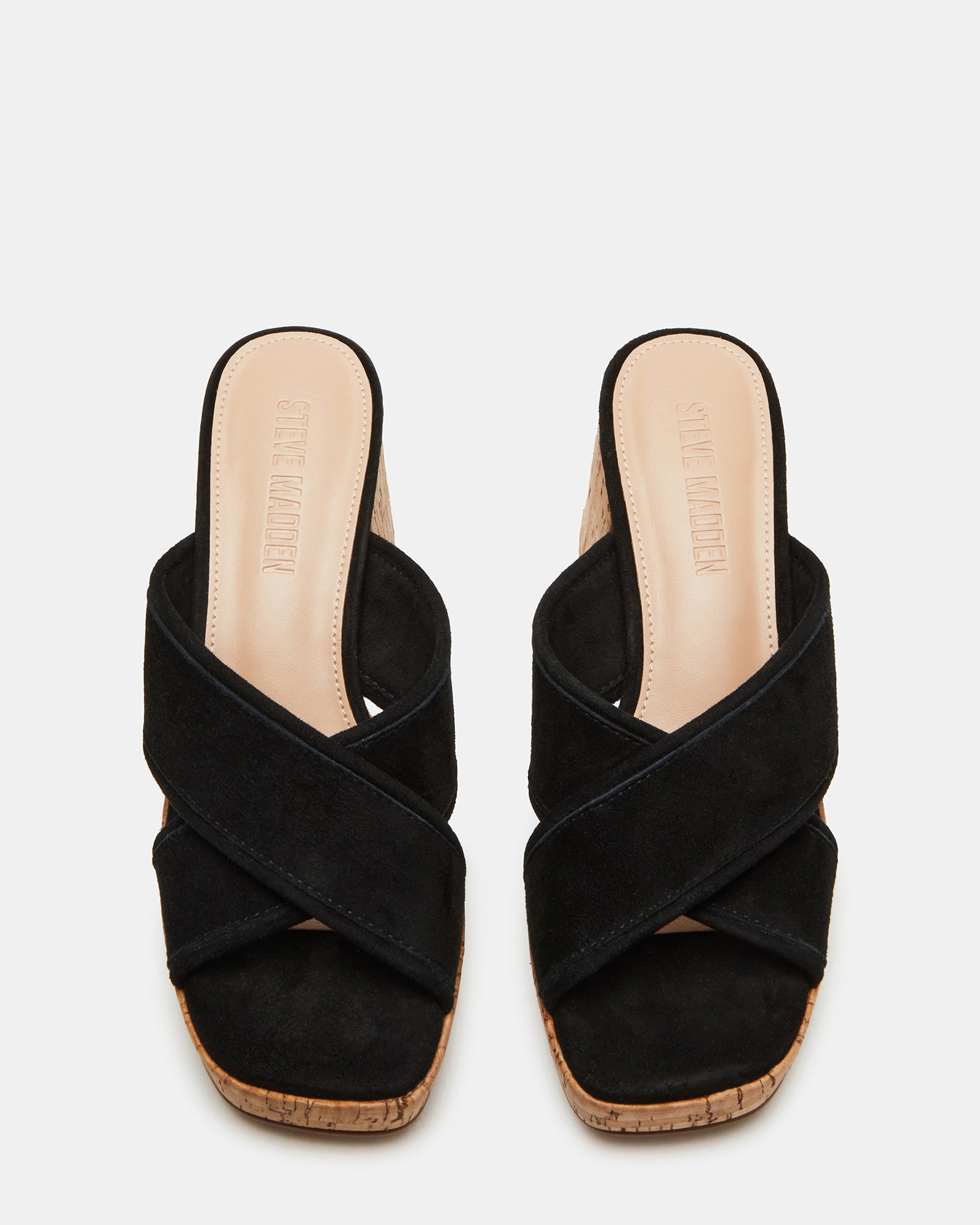 Side view of black suede platform sandals with square toe and 3-inch heel