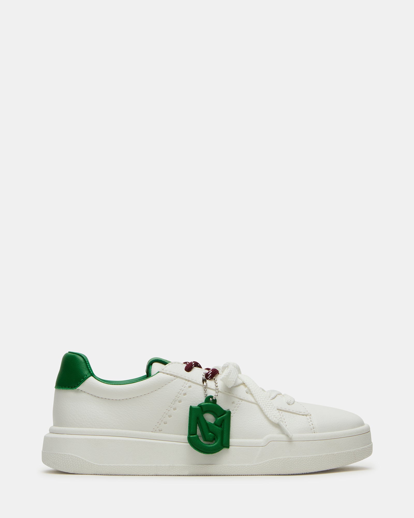 Front view of Marvin white and green low-top sneakers with shoe charm detail