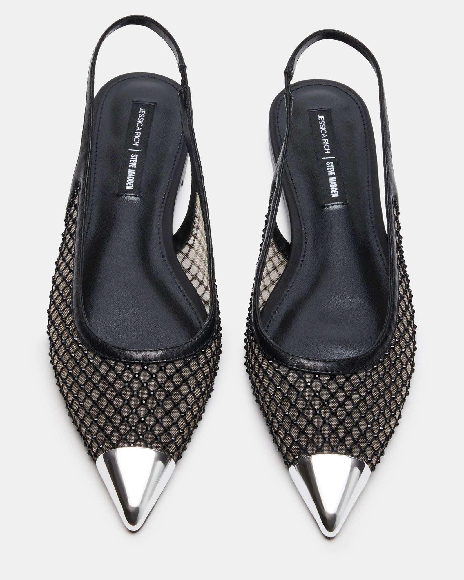 Top-down view showcasing pointed toe and slingback design on a city pavement