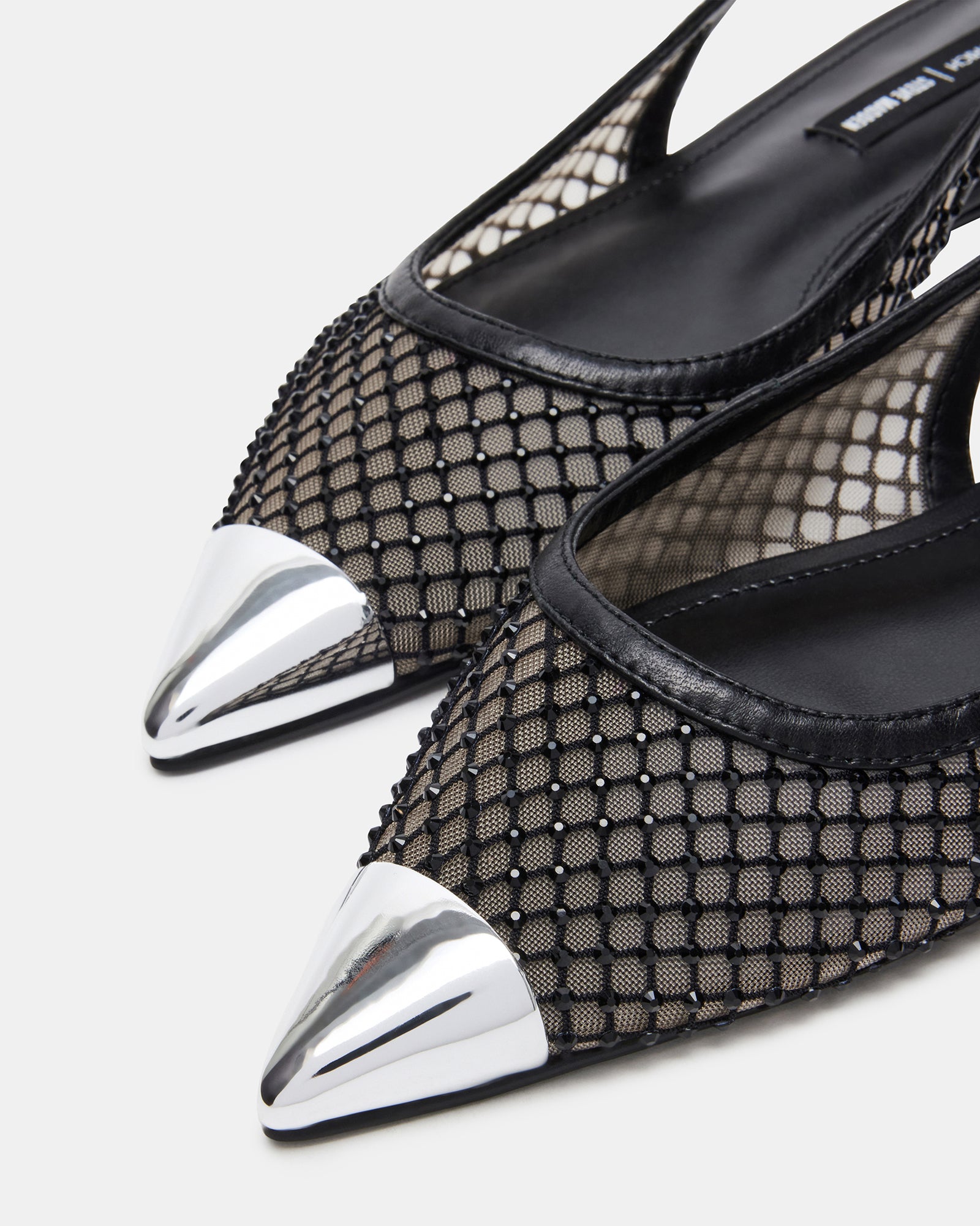 Close-up of textured mesh upper and stitching detail, perfect for dress occasions
