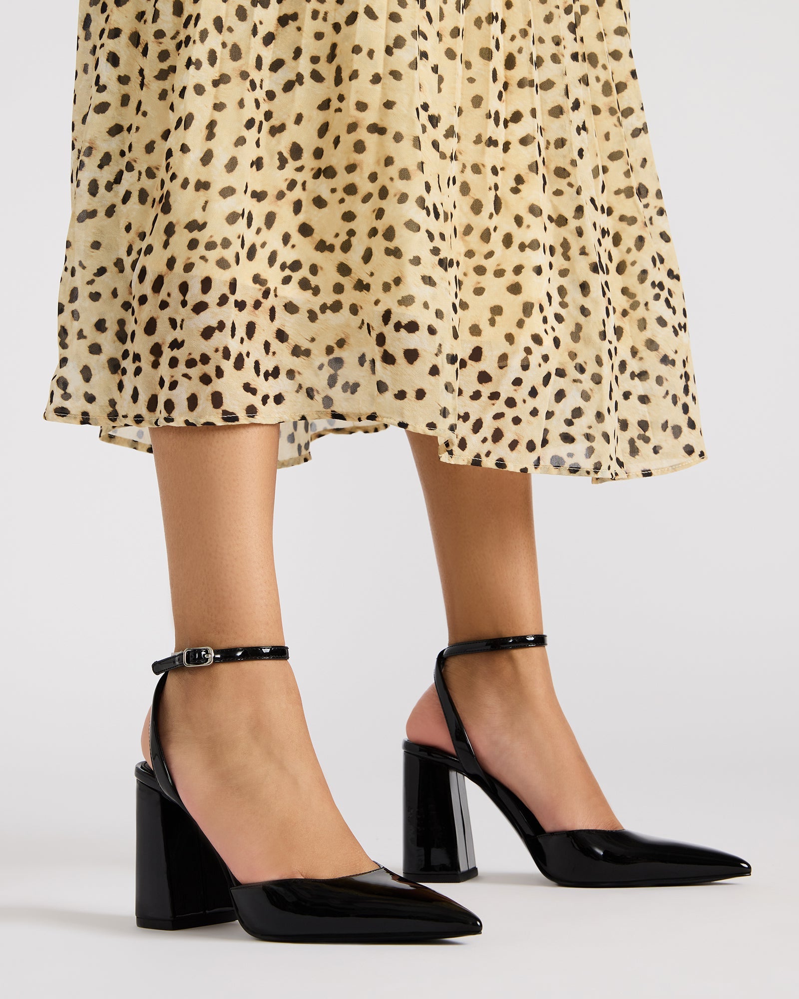 MATTEA womens pumps styled with a chic outfit for a night out.