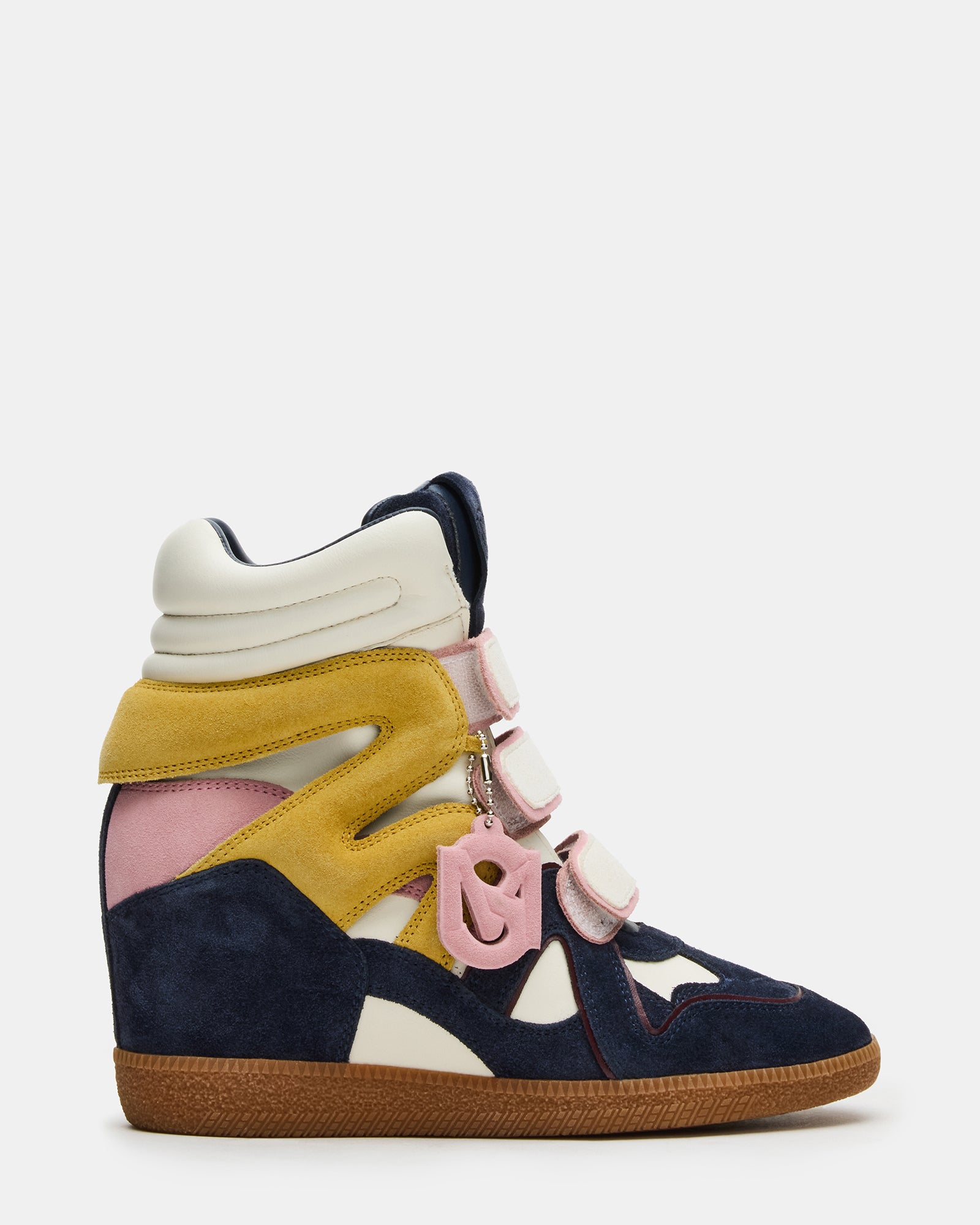 Mavis navy suede high-top sneakers for women, front angle on urban sidewalk.