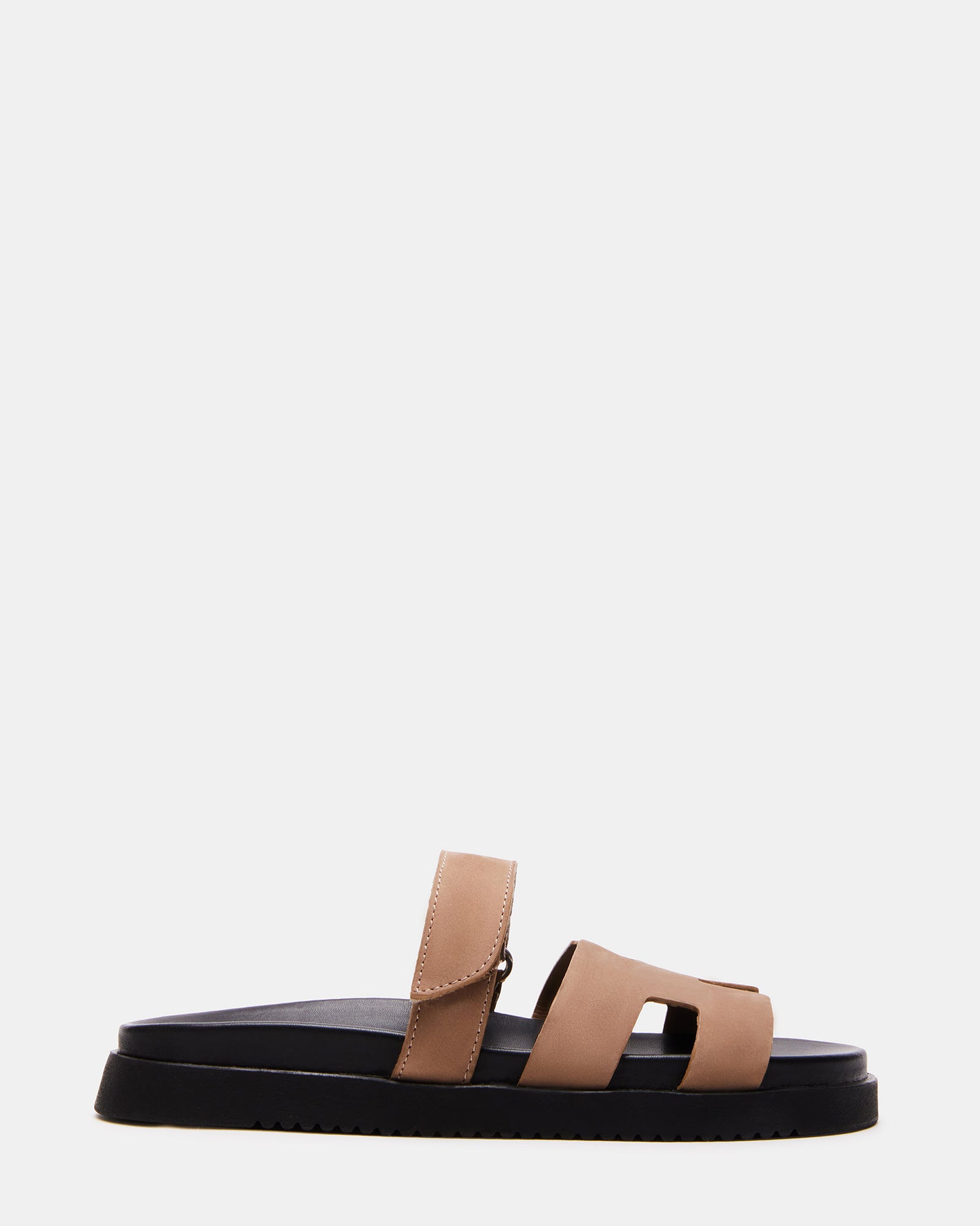 Side view of tan nubuck slide sandals showing flatform sole and strap design