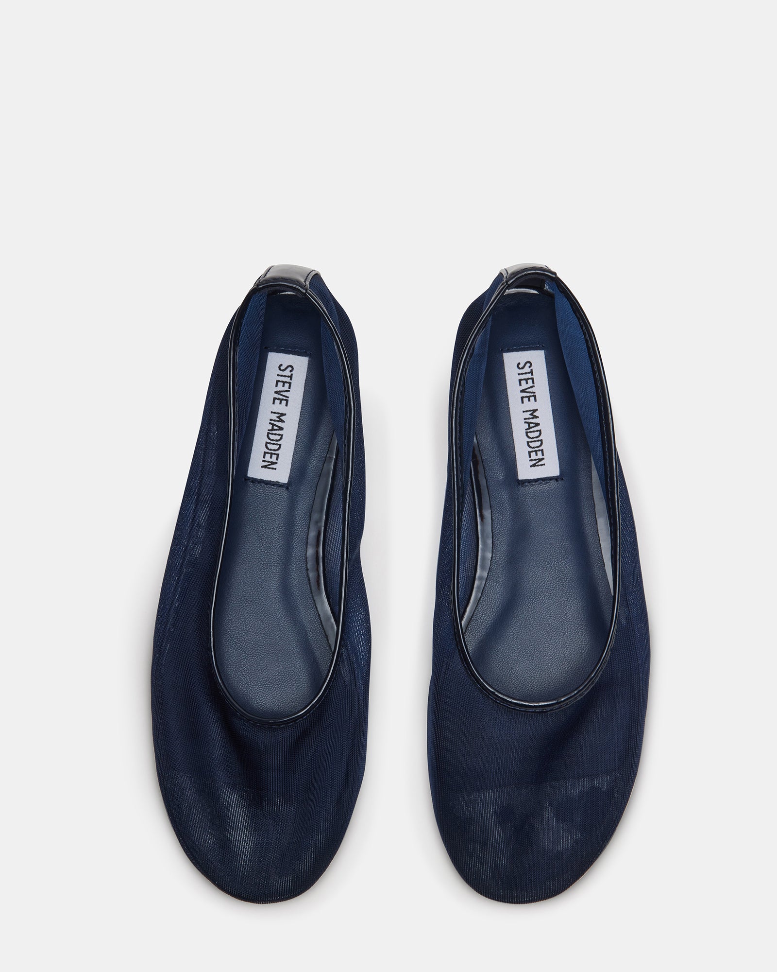 Close-up of navy mesh ballet flats with rounded toe and breathable fabric
