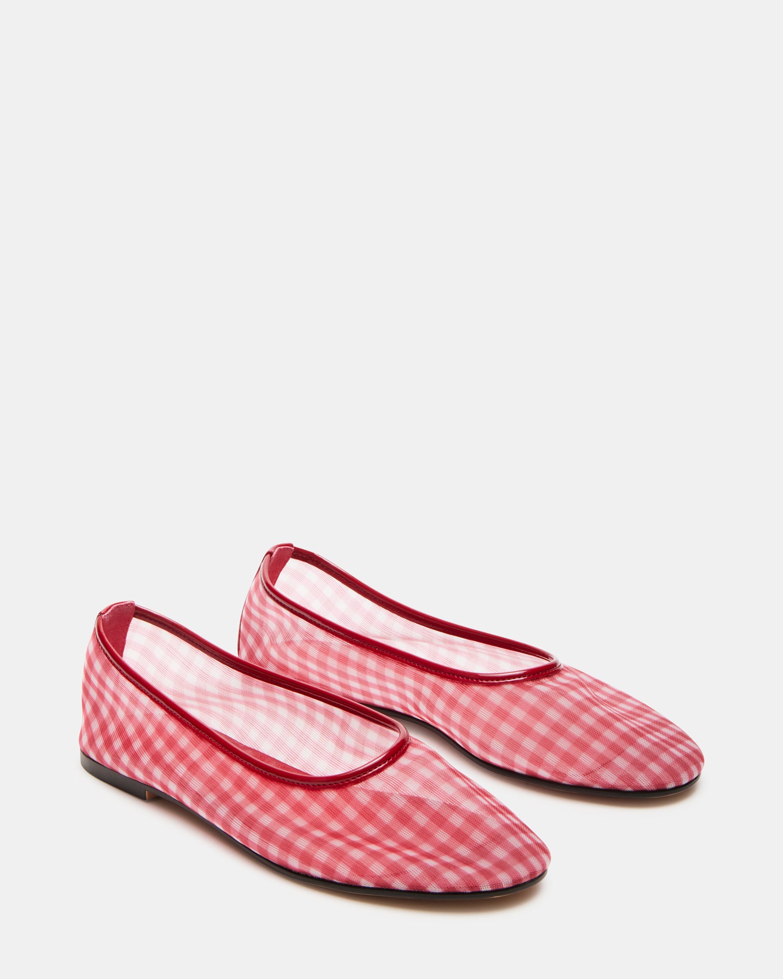 Meadow ballet flats worn in a casual outdoor setting.