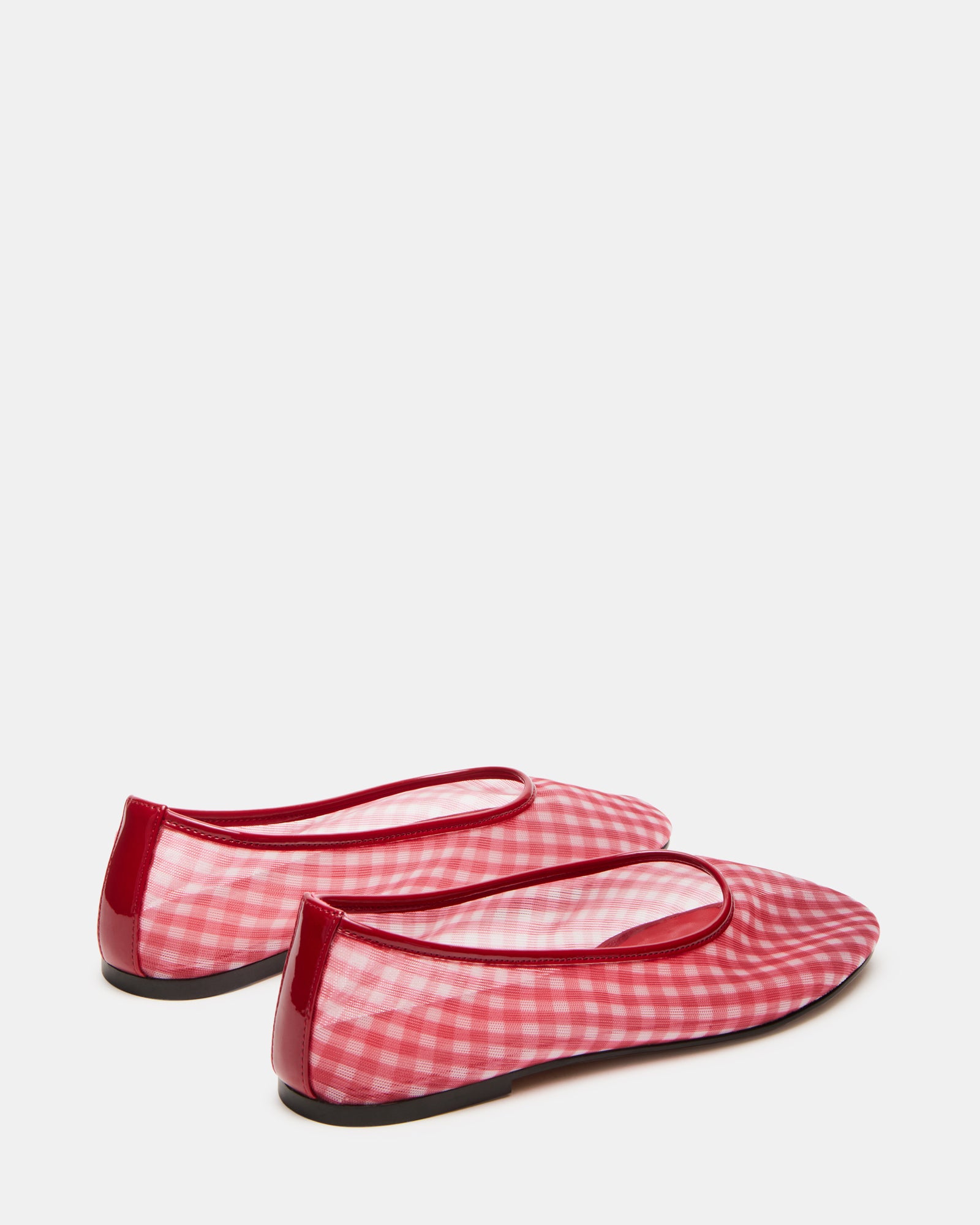 Meadow ballet flats worn in a casual outdoor setting.