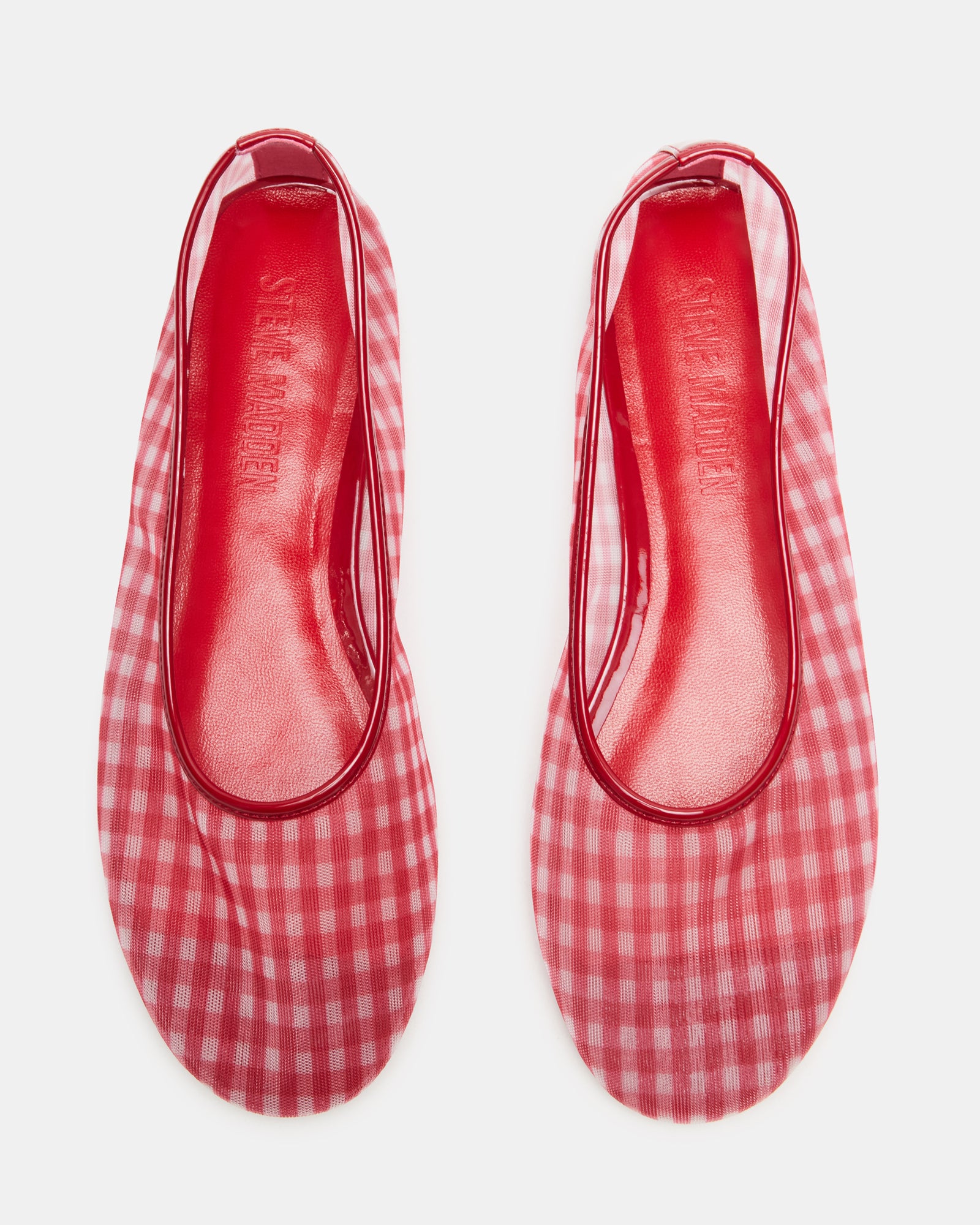 Close-up of Meadow red ballet flats with breathable mesh material.