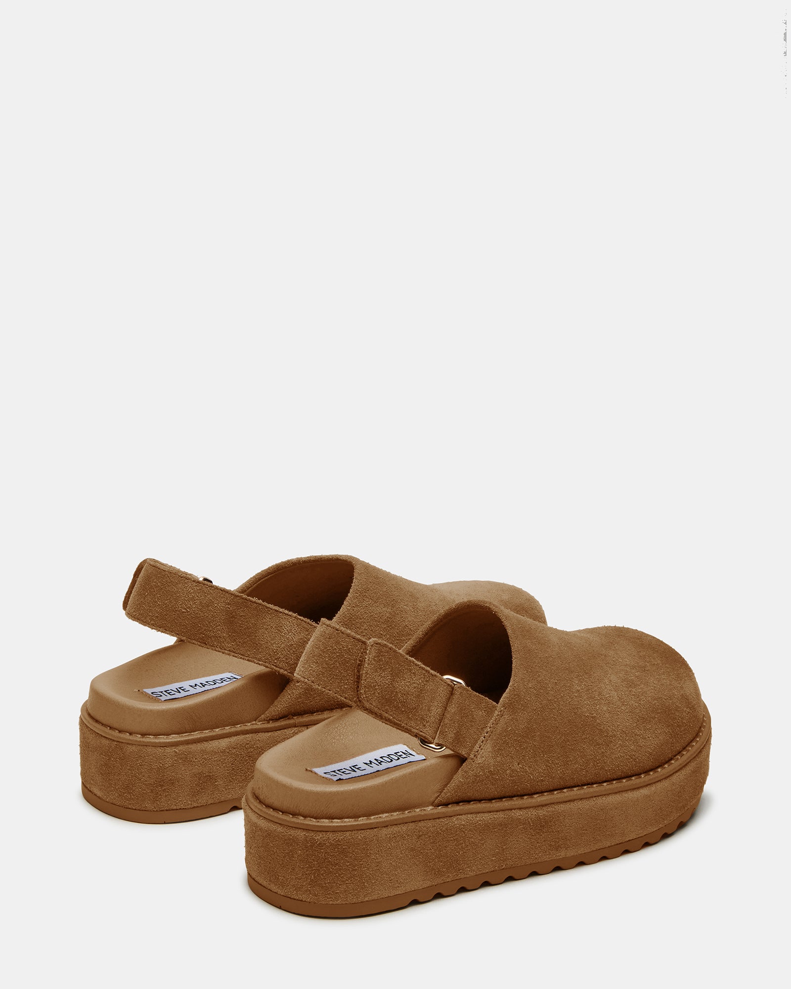 Profile angle showing 2-inch heel height and slingback strap on ugg-style clogs