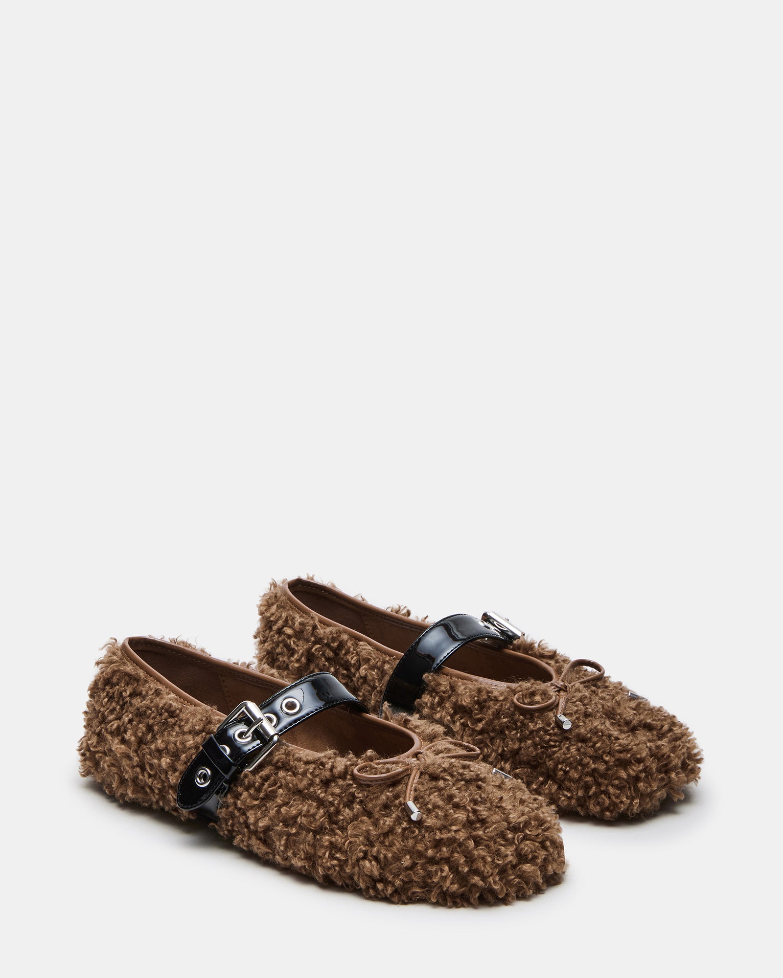 Side profile of womens ballet flats with Mary Jane strap and textured sole
