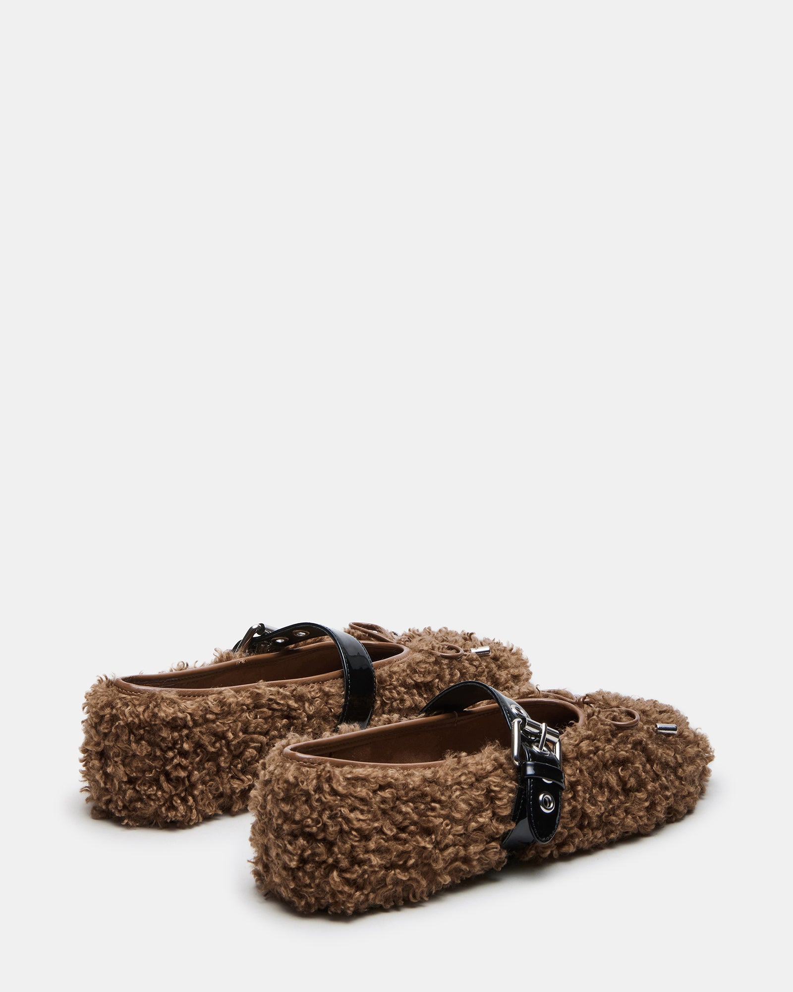Side profile of womens ballet flats with Mary Jane strap and textured sole