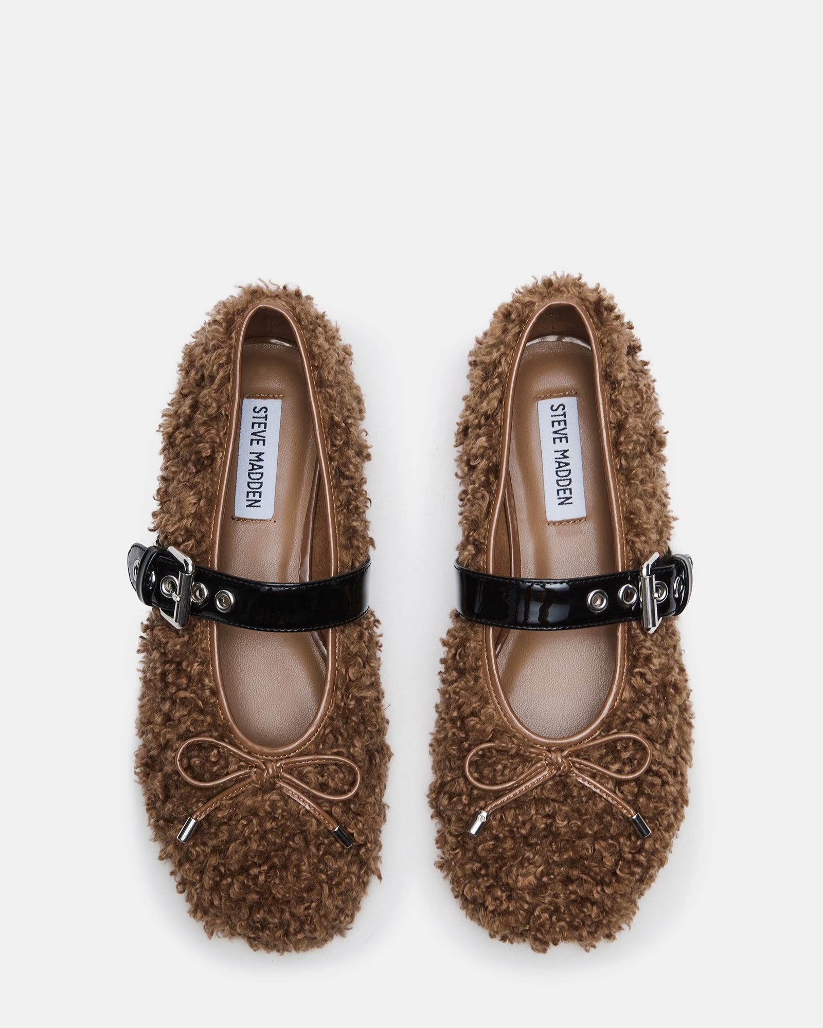 Front view of Melvin Camel Multi ballet flats showcasing faux shearling and bow accent