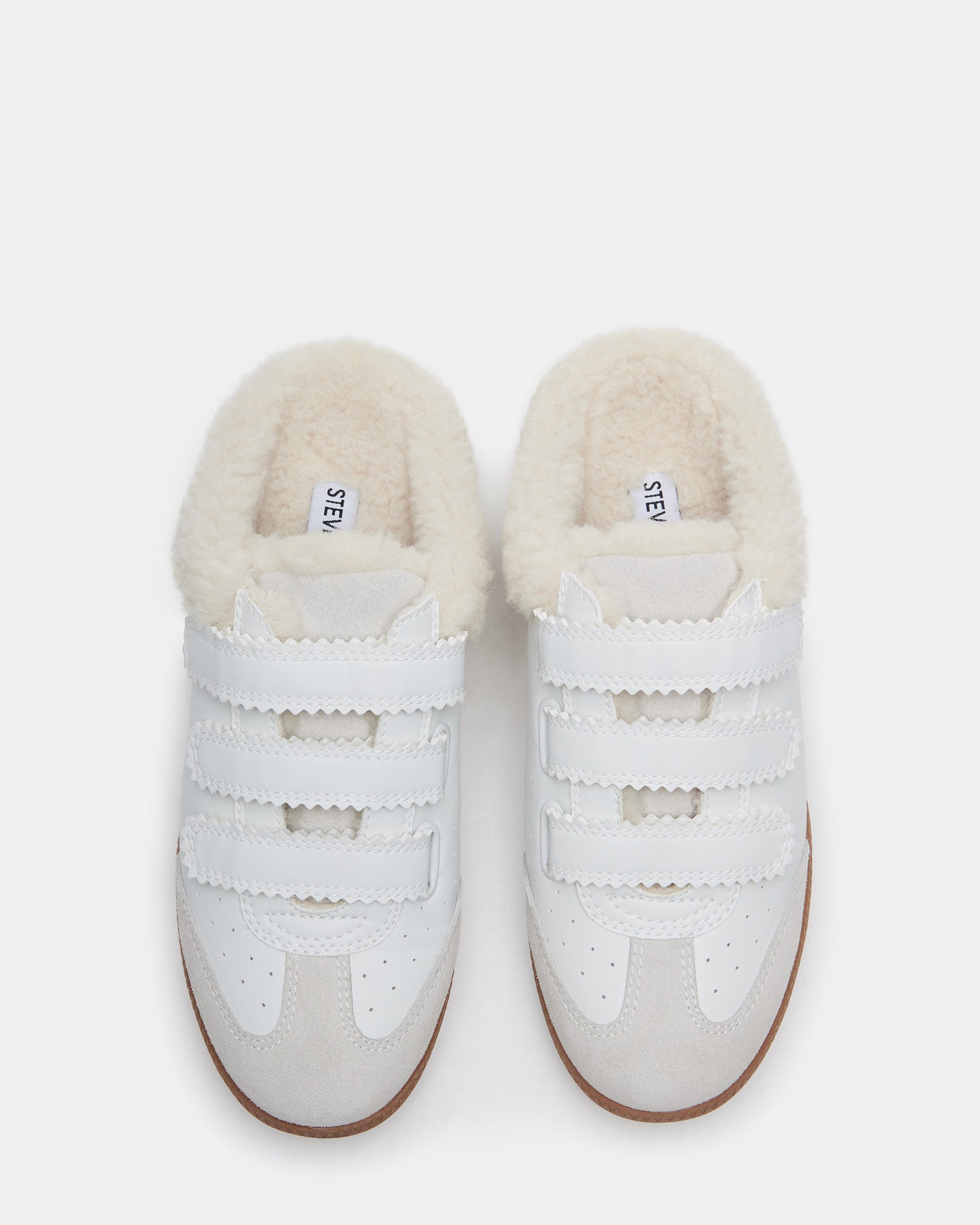 Side angle of faux fur sneakers with synthetic sole and comfortable fit, ideal for daily use