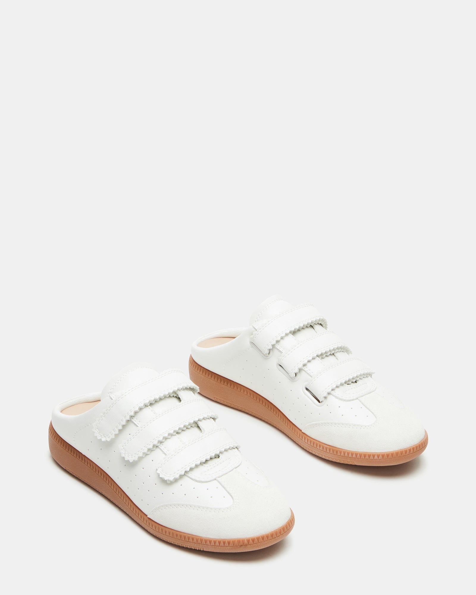 Close-up of leather and suede upper on slip-on sneakers