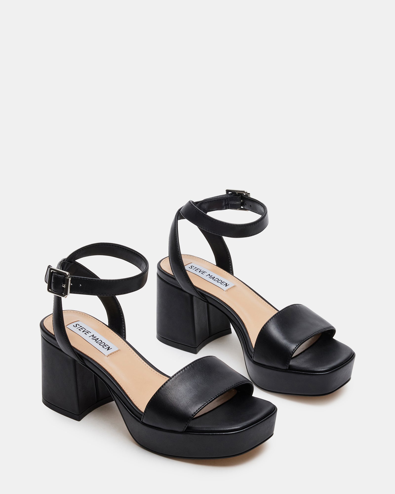 Close-up of the leather upper and textured sole of the platform heels