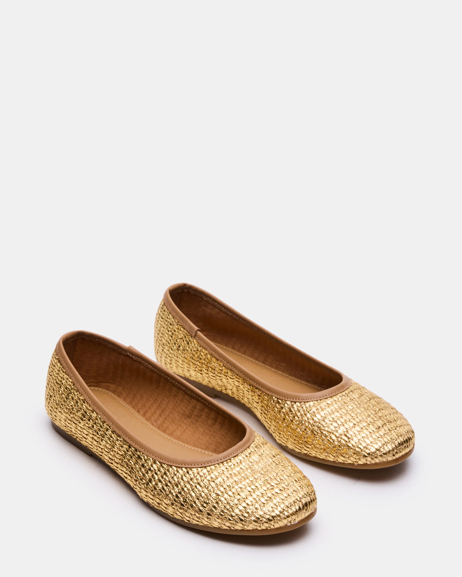 Merlot gold flats styled with linen trousers for summer outfits