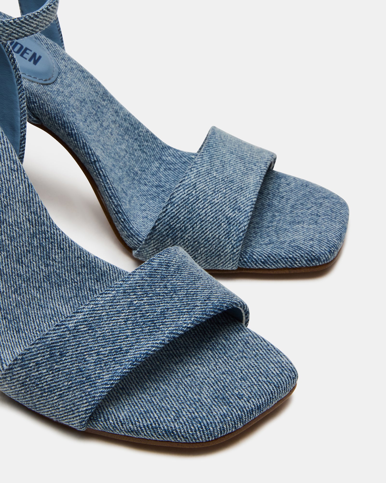 MESSA black square toe heels styled with tailored trousers for a professional look