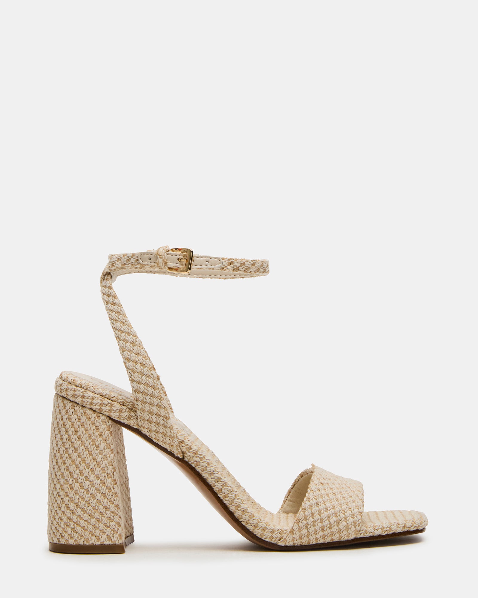 Side view of nude block heel shoes with ankle strap for a chic look.