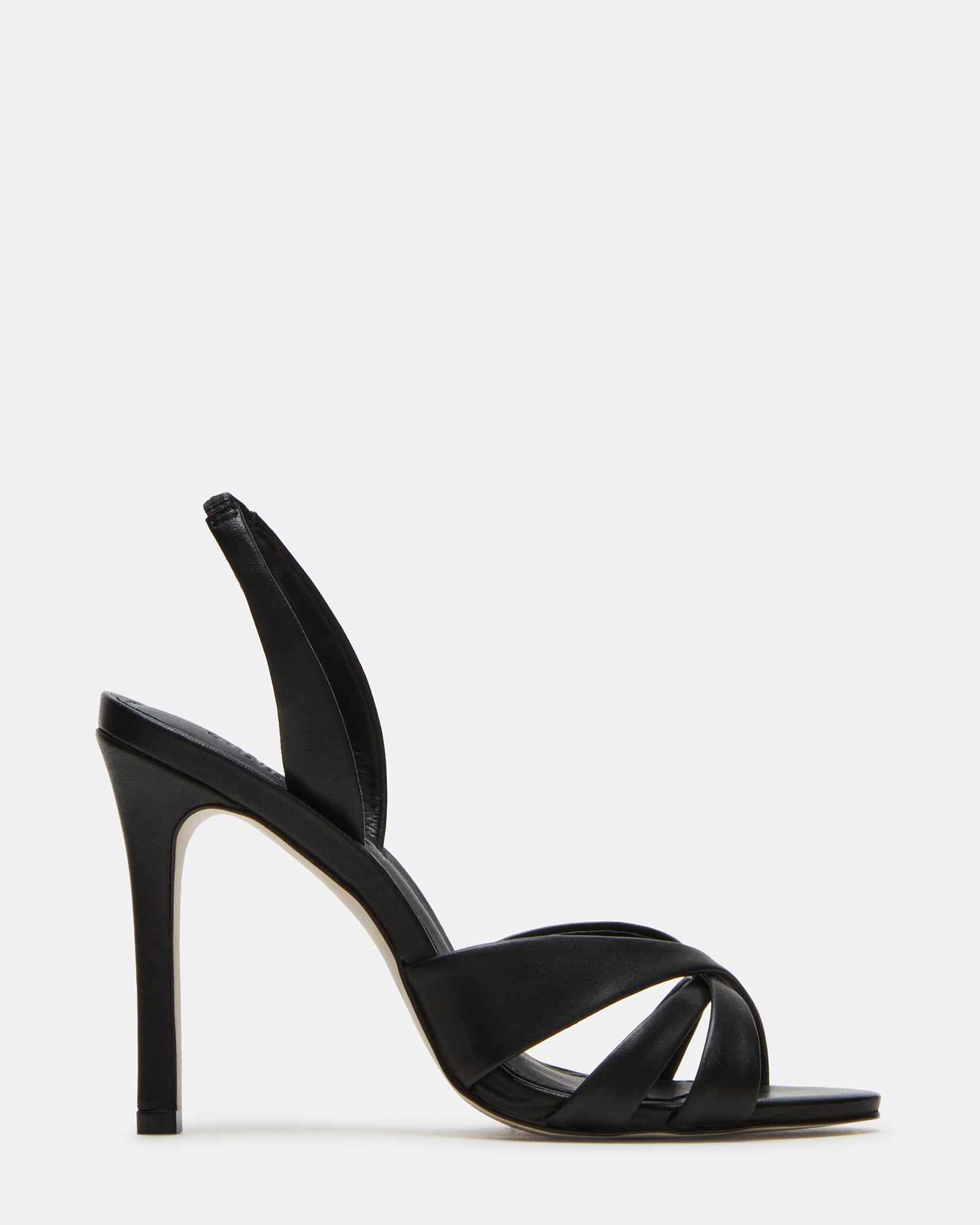 Close-up of MINX black patent leather stiletto heels highlighting the slingback strap detail