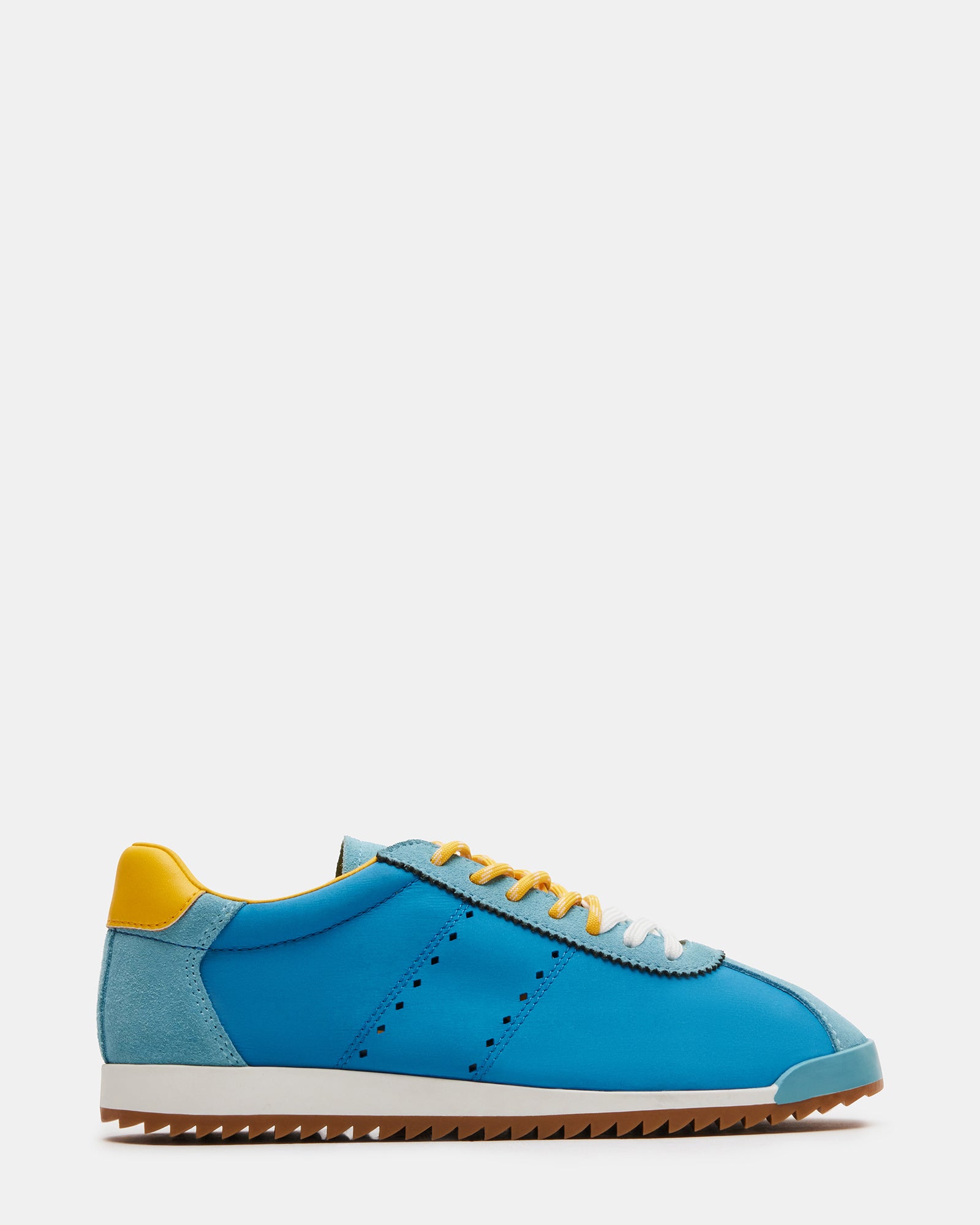 Close-up of Mirage low-top sneakers showing suede and textile details
