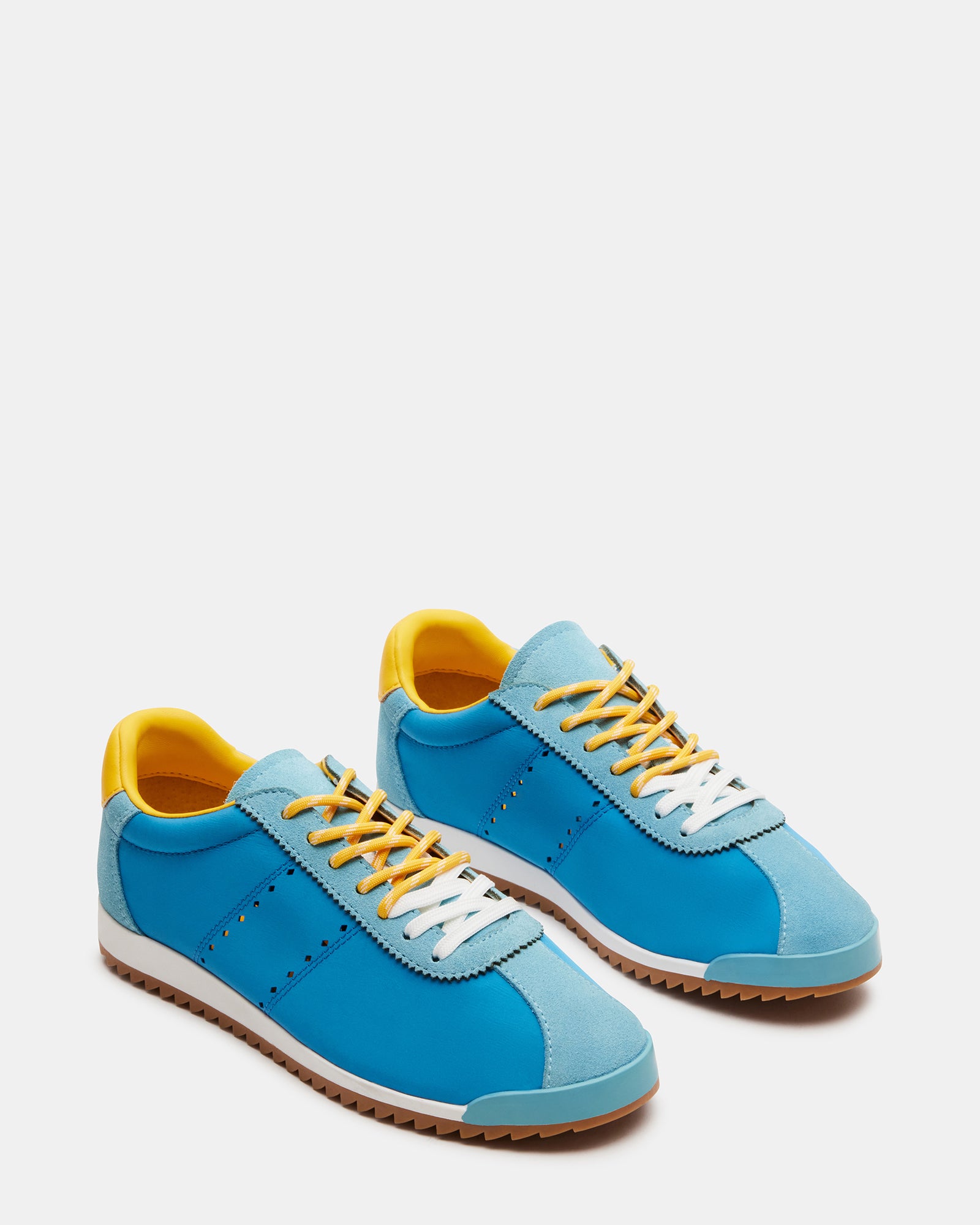 Mirage sneakers with striped laces, displayed on a neutral background
