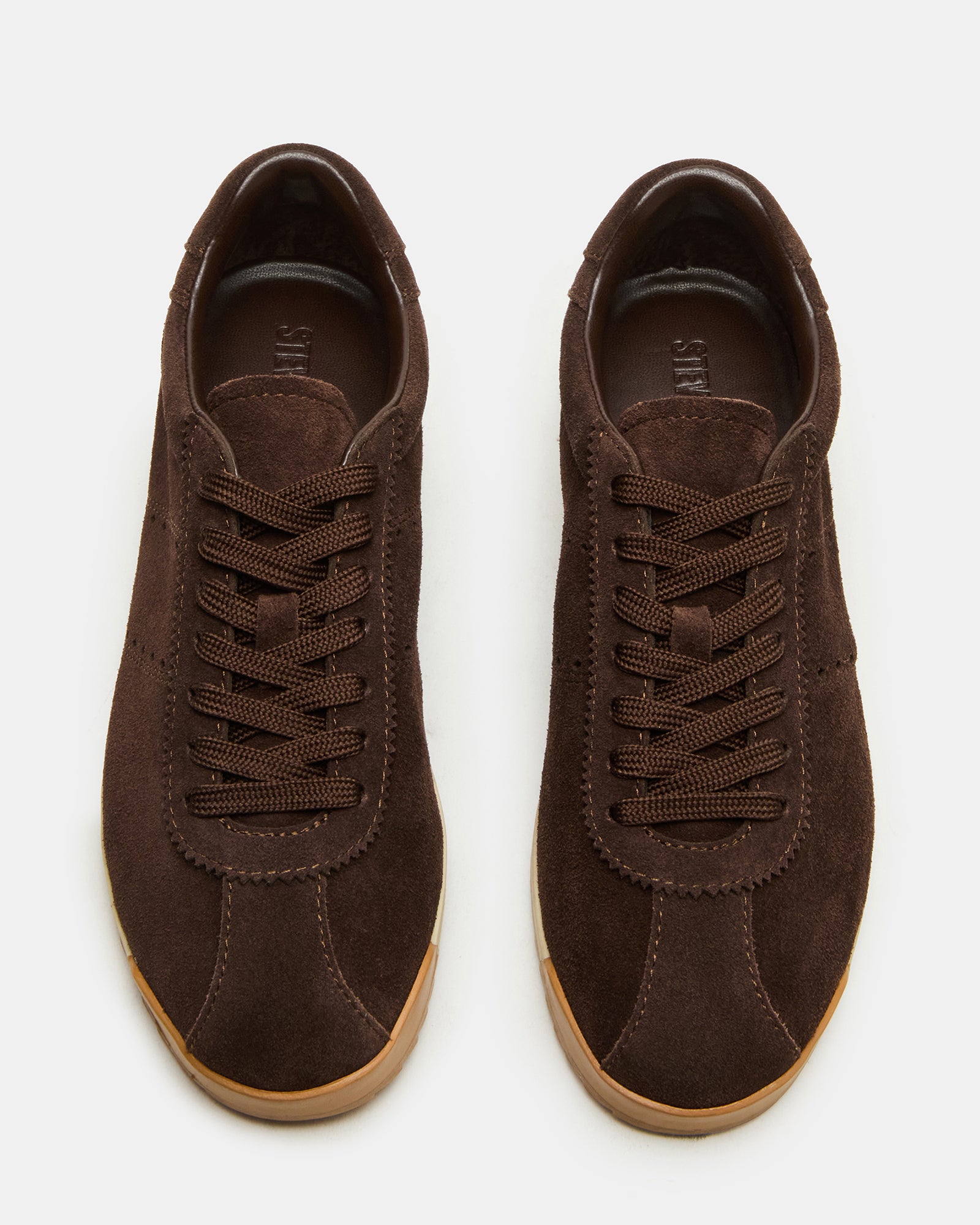 Side profile of mens casual shoes highlighting the .75-inch heel and sleek silhouette