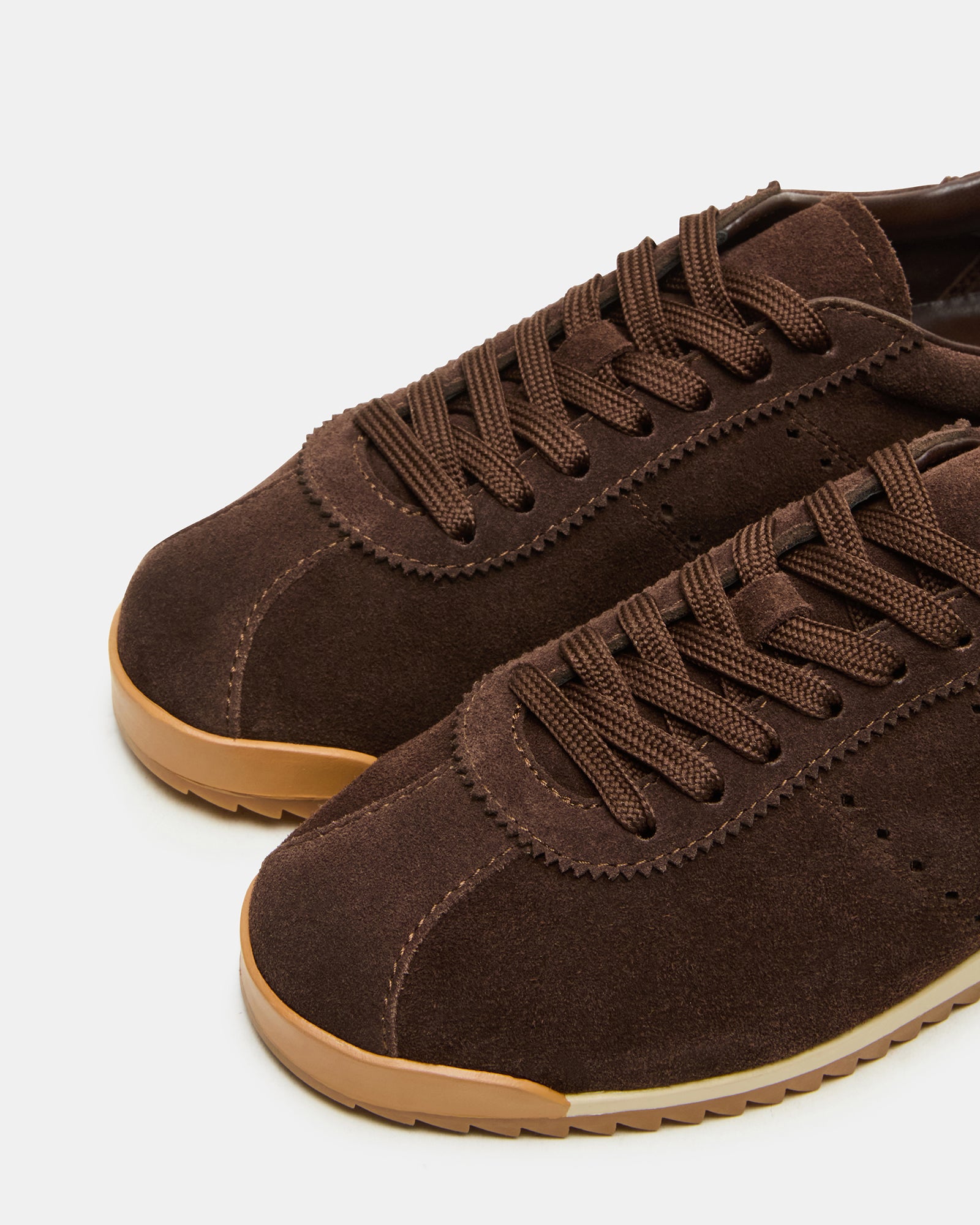Mirage brown suede sneakers front view, showcasing textured upper and lace design