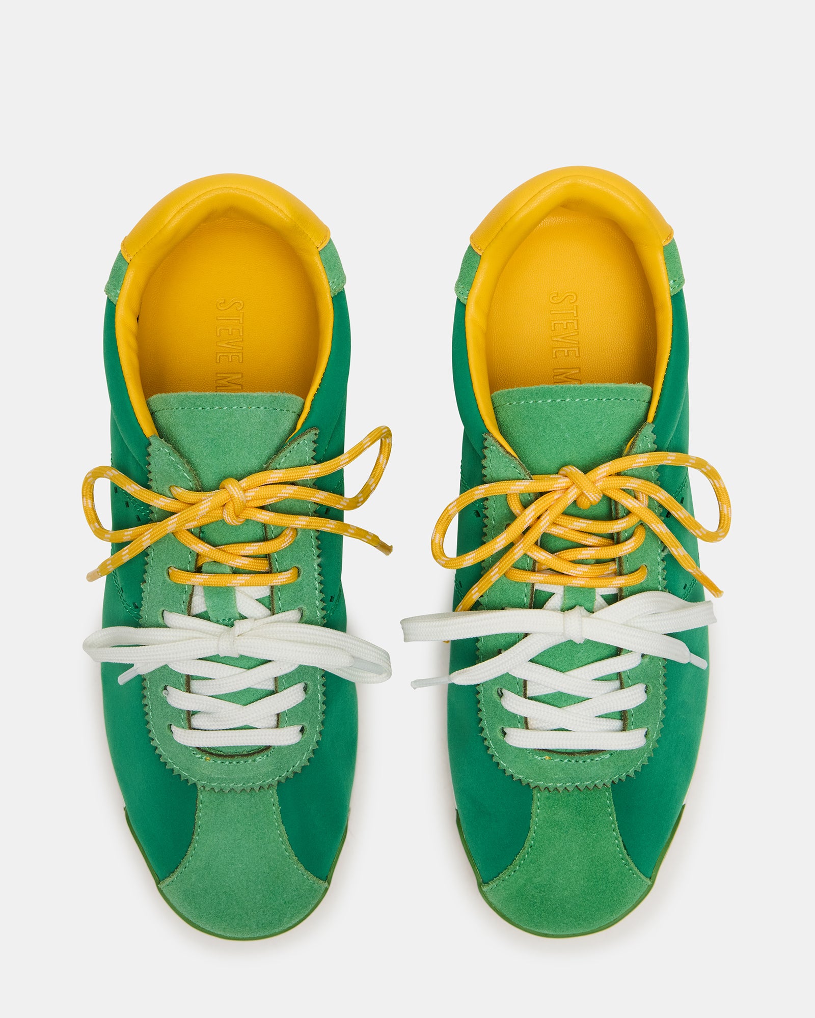 Top-down detail showing textile-suede blend and alternate white laces