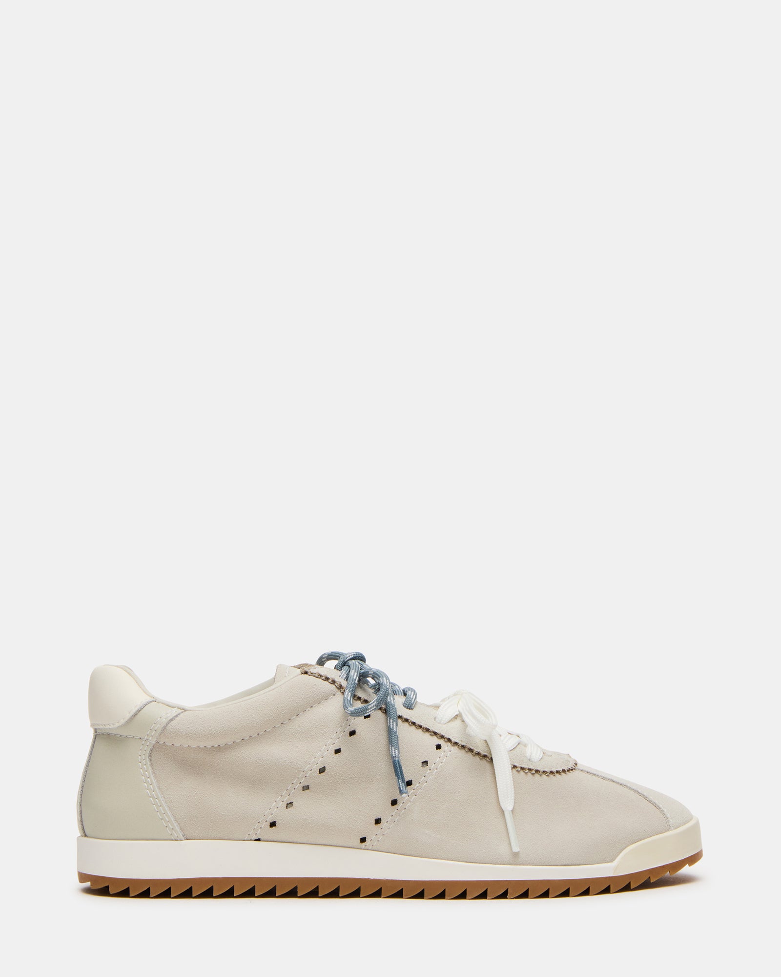 Top angle of lace-up sneakers showing dual lace colors and suede texture