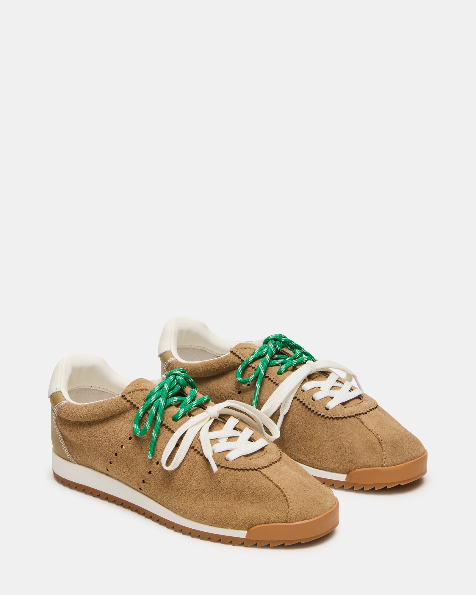 Close-up of Mirage lace-up sneakers highlighting suede texture and laces.