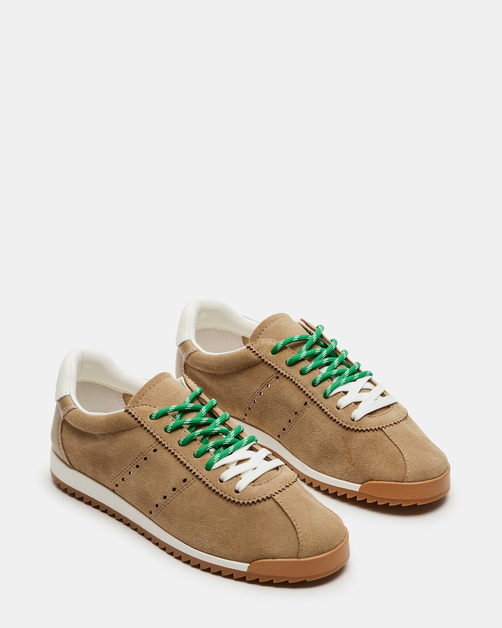 Side view of Mirage suede shoes demonstrating versatility and style.