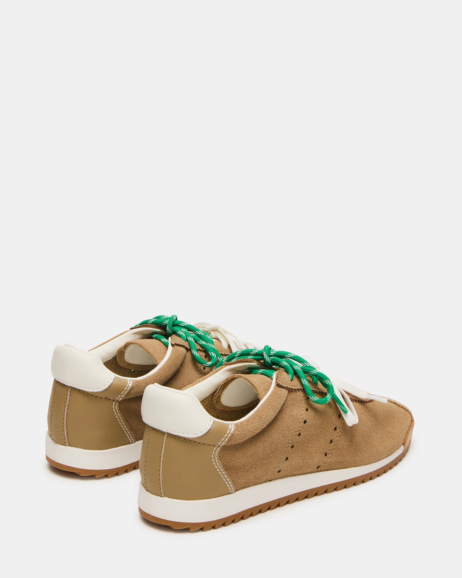 Close-up of Mirage lace-up sneakers highlighting suede texture and laces.