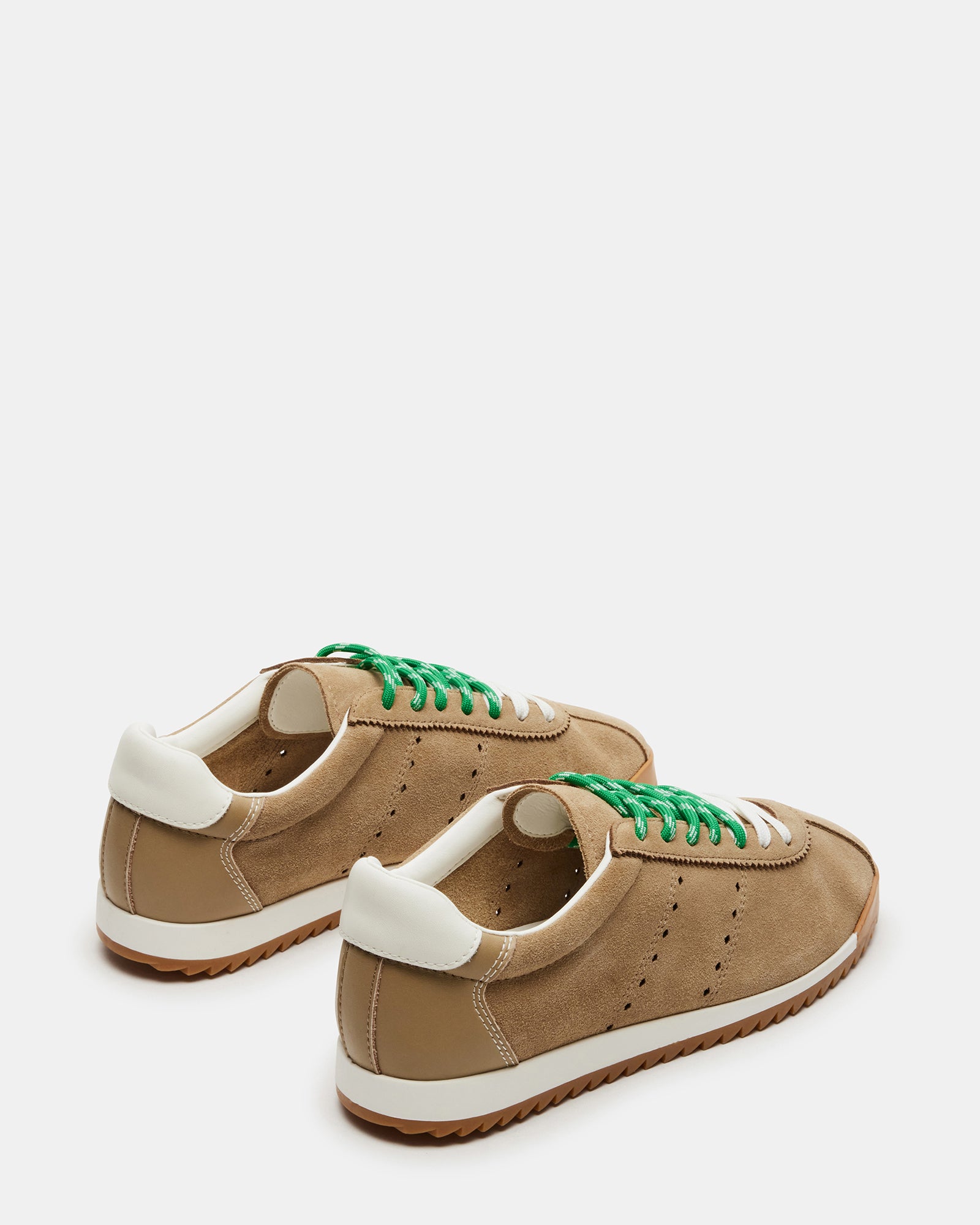 Side view of Mirage suede shoes demonstrating versatility and style.