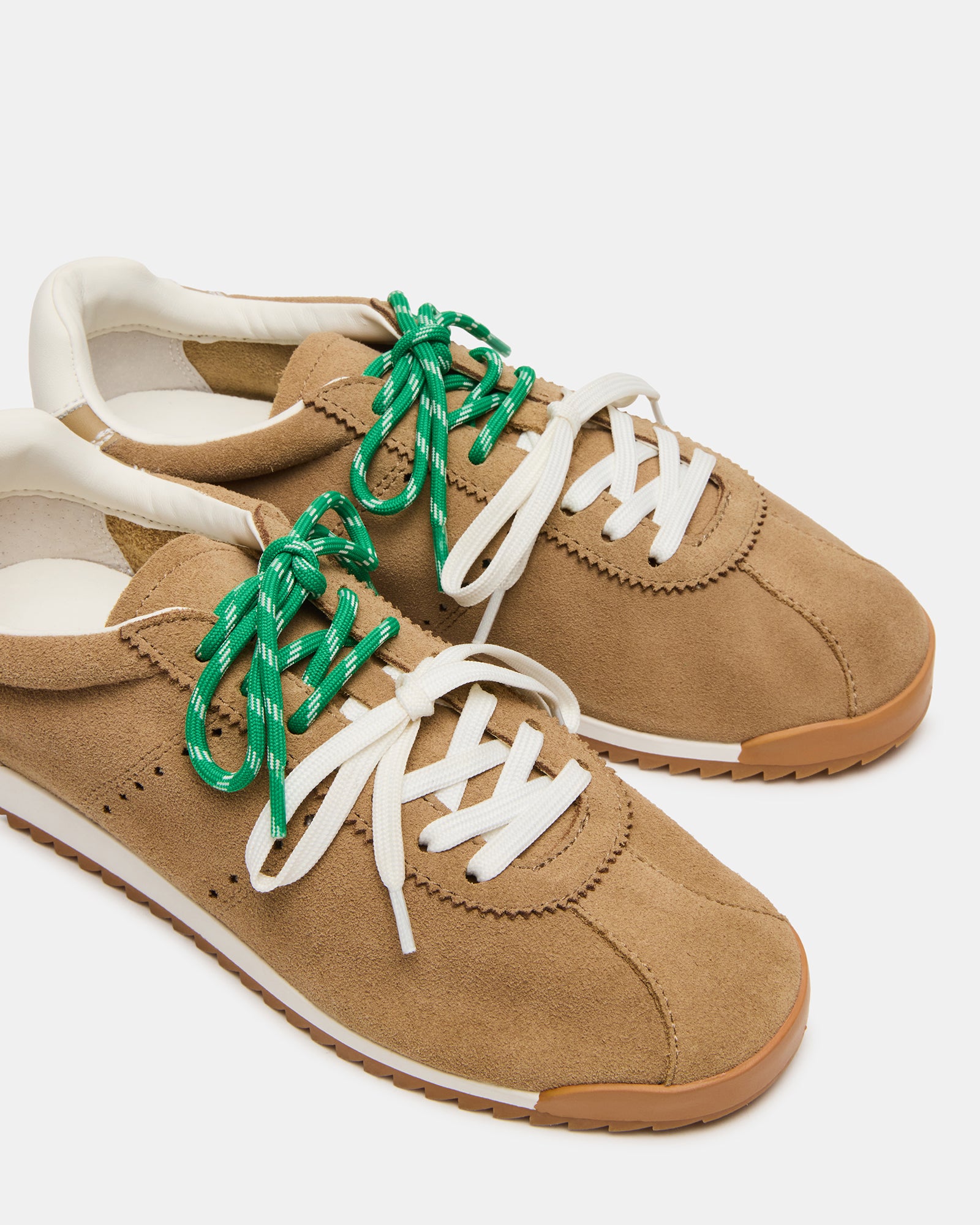 Side view of Mirage suede shoes demonstrating versatility and style.