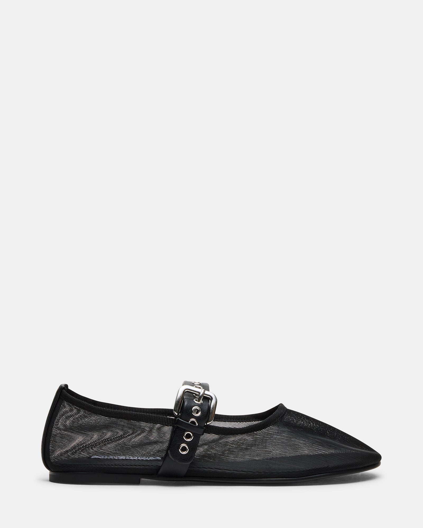 Black Mitsy Mary Jane shoes styled with cropped trousers for work