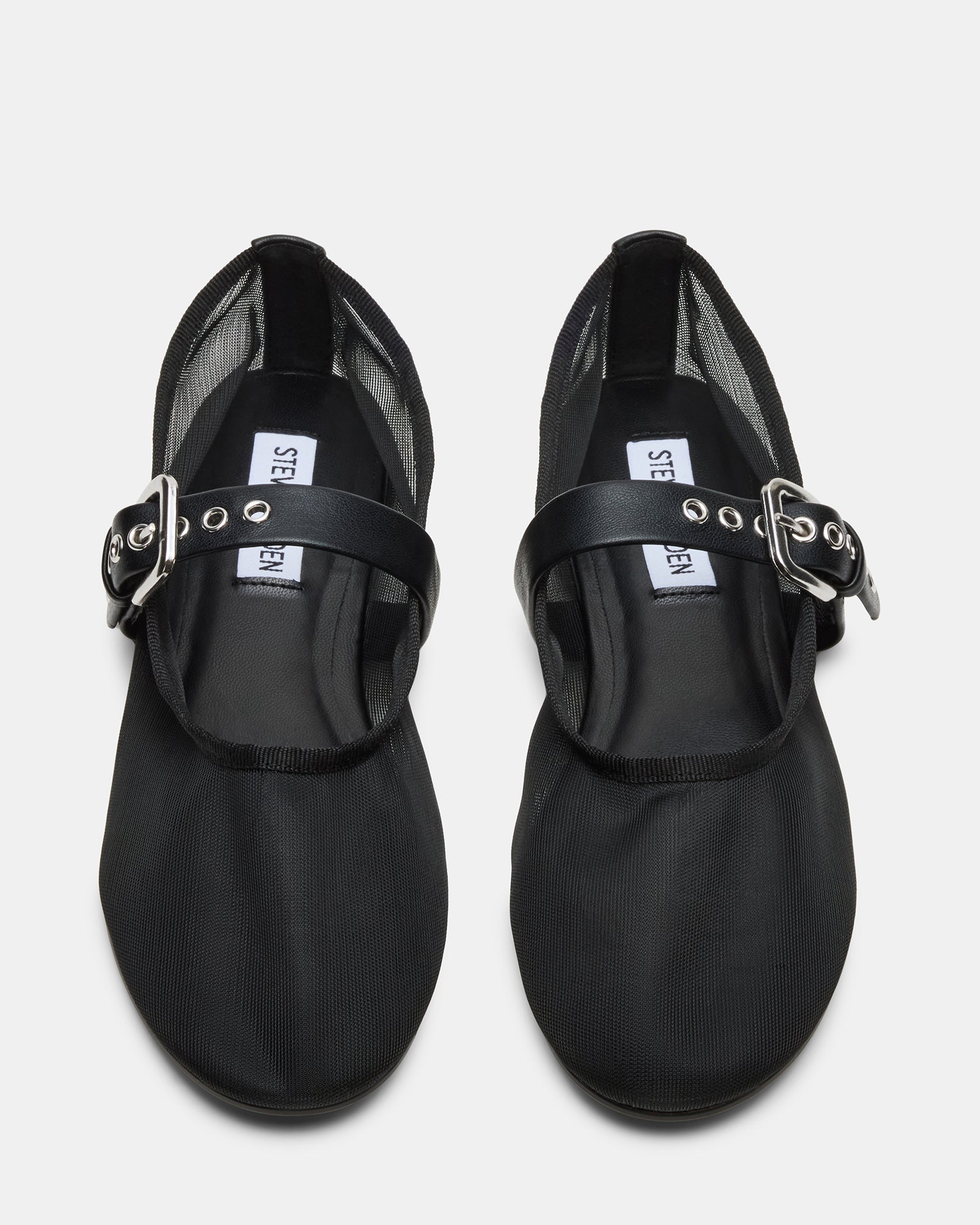 Black Mitsy Mary Jane shoes styled with cropped trousers for work