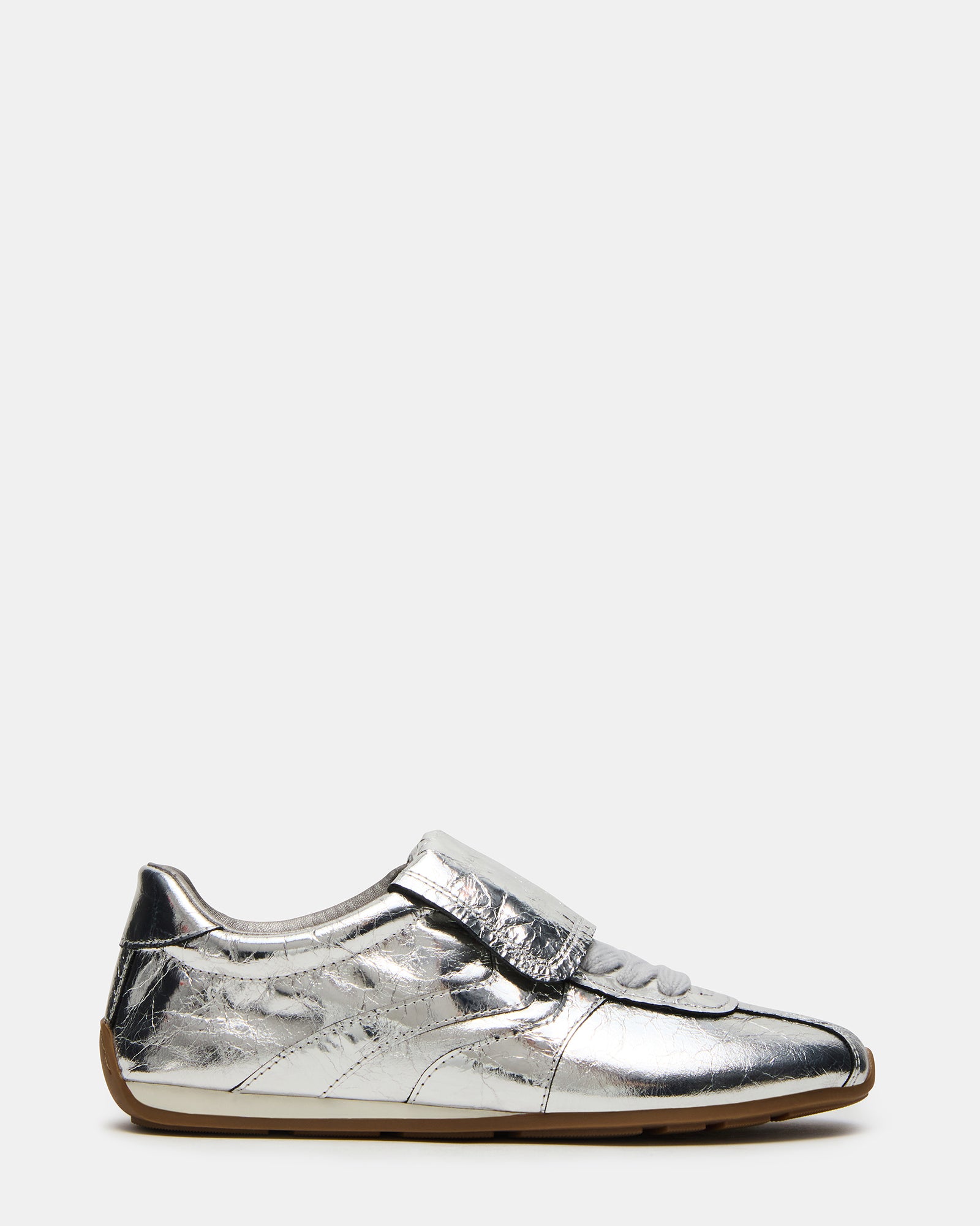 Side view of Mobility Silver Leather sneakers highlighting the low-top design and premium leather material