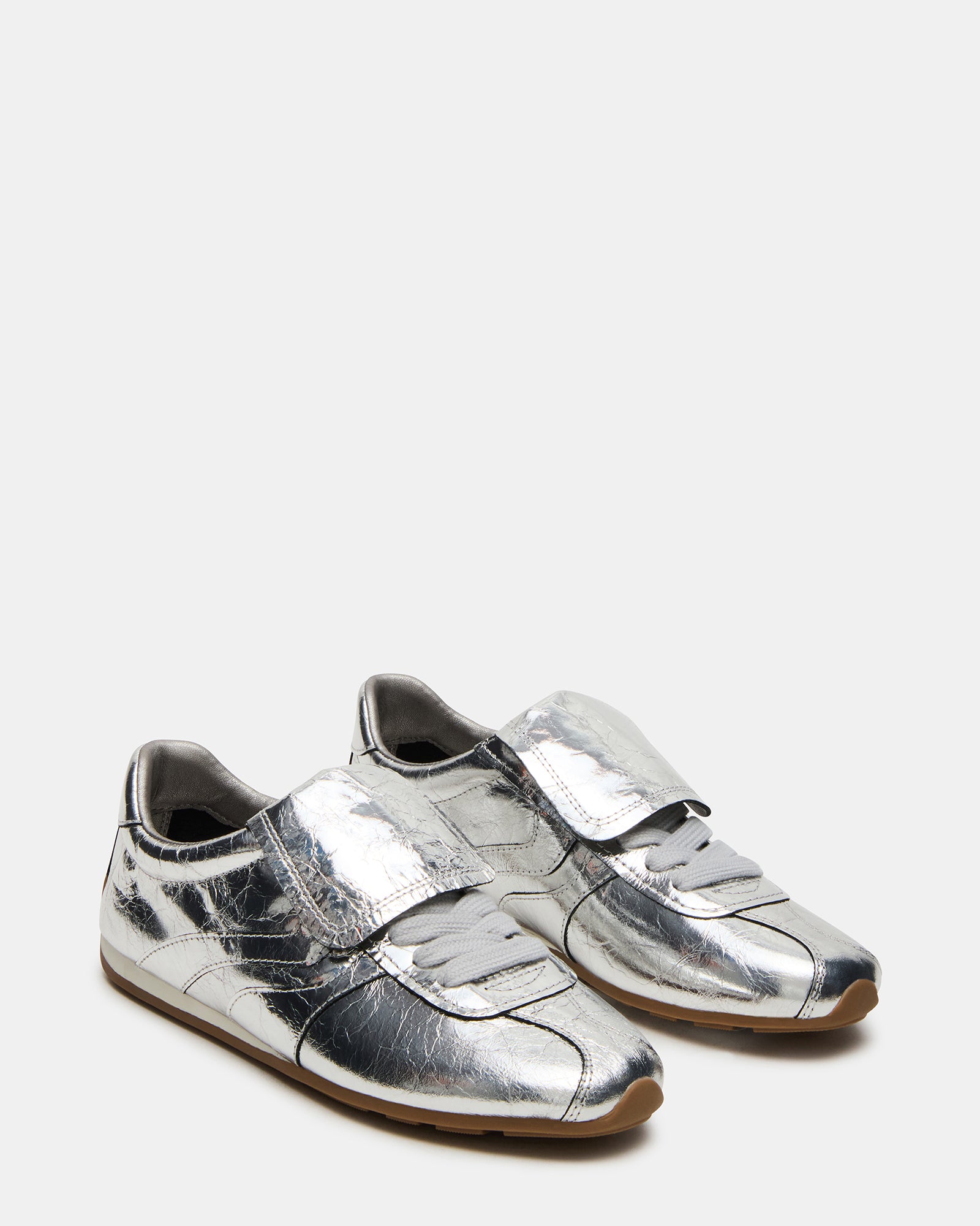 Top view of the sneakers showing the lace-up closure and stylish silhouette